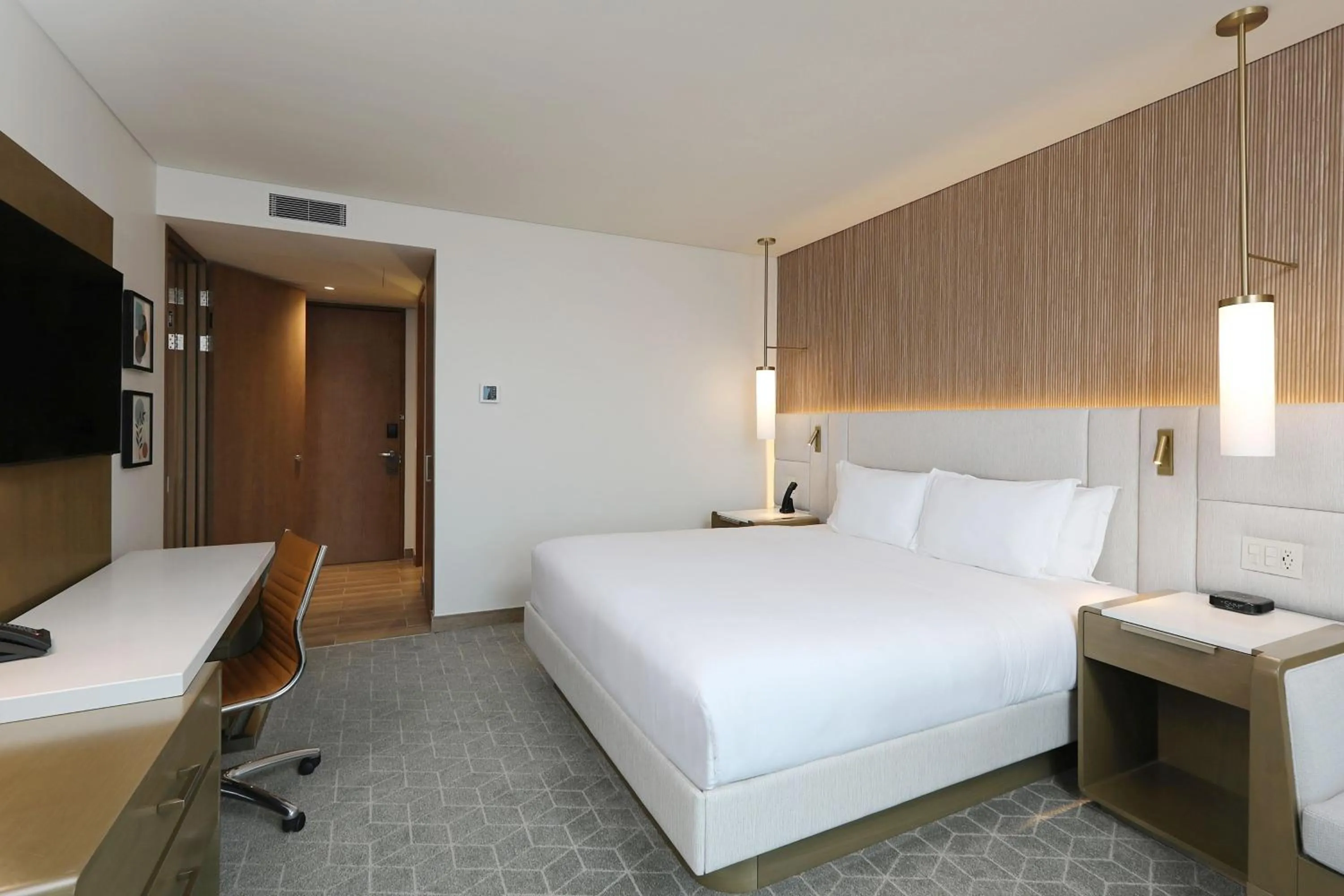 Photo of the whole room, Bed in Courtyard by Marriott Santo Domingo Piantini