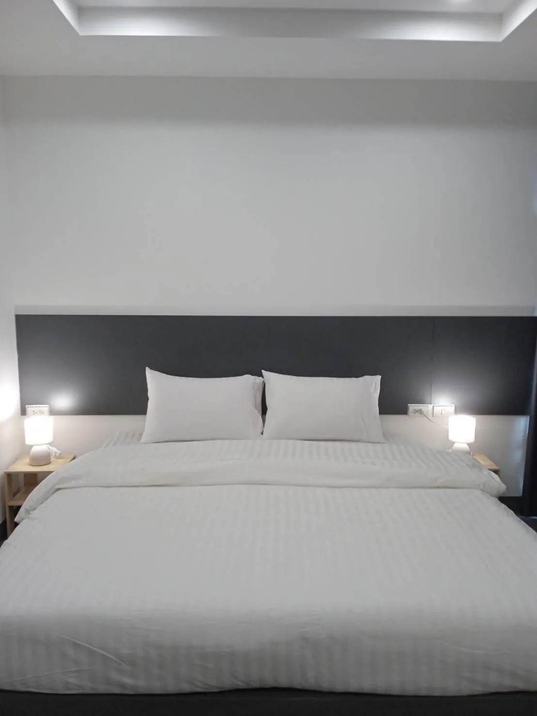 Bed in D Night Suite Hotel