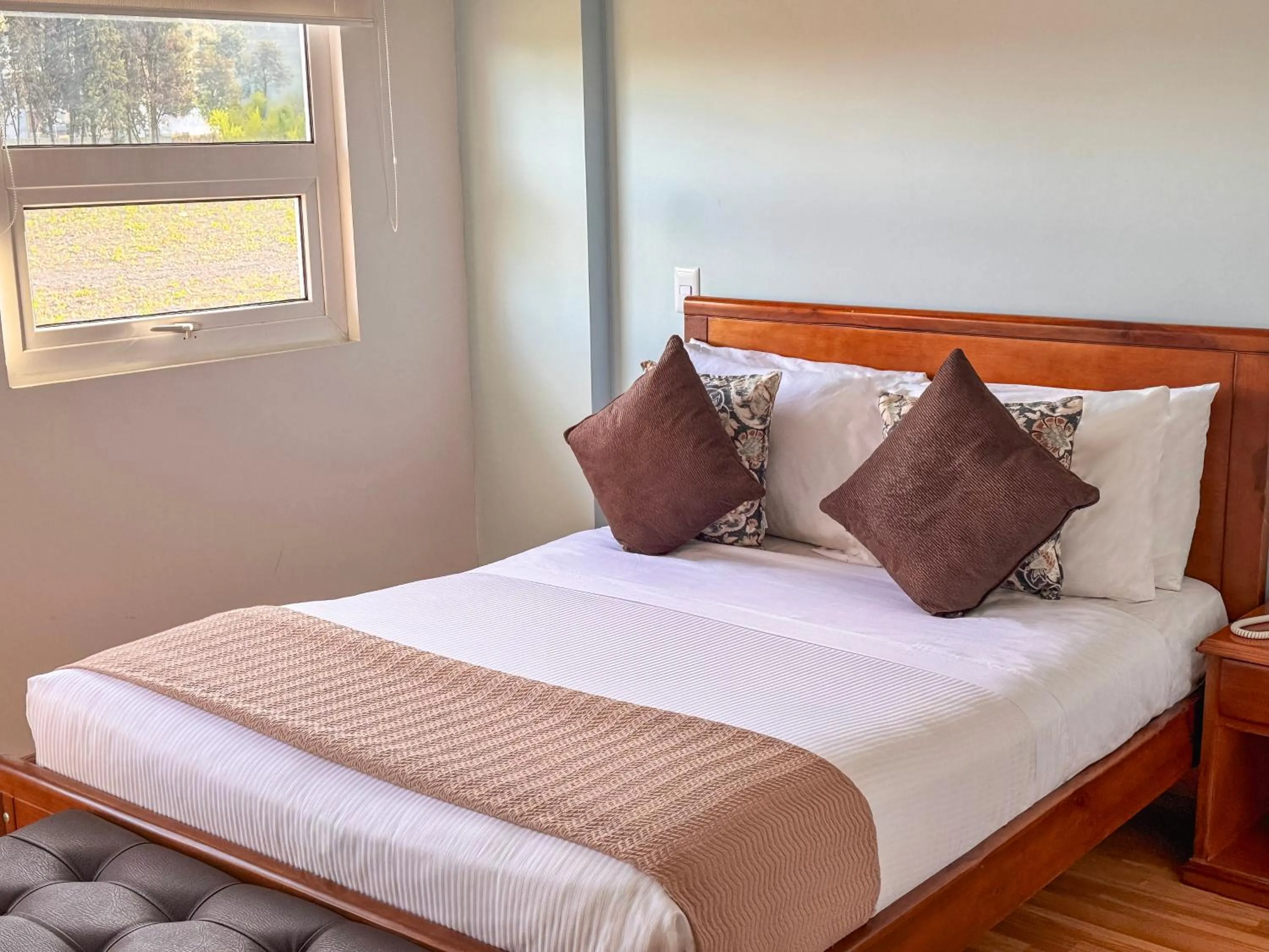 Bed in Hotel Xue Sabana