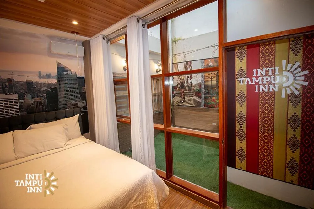 Bed in Inti Tampu Inn