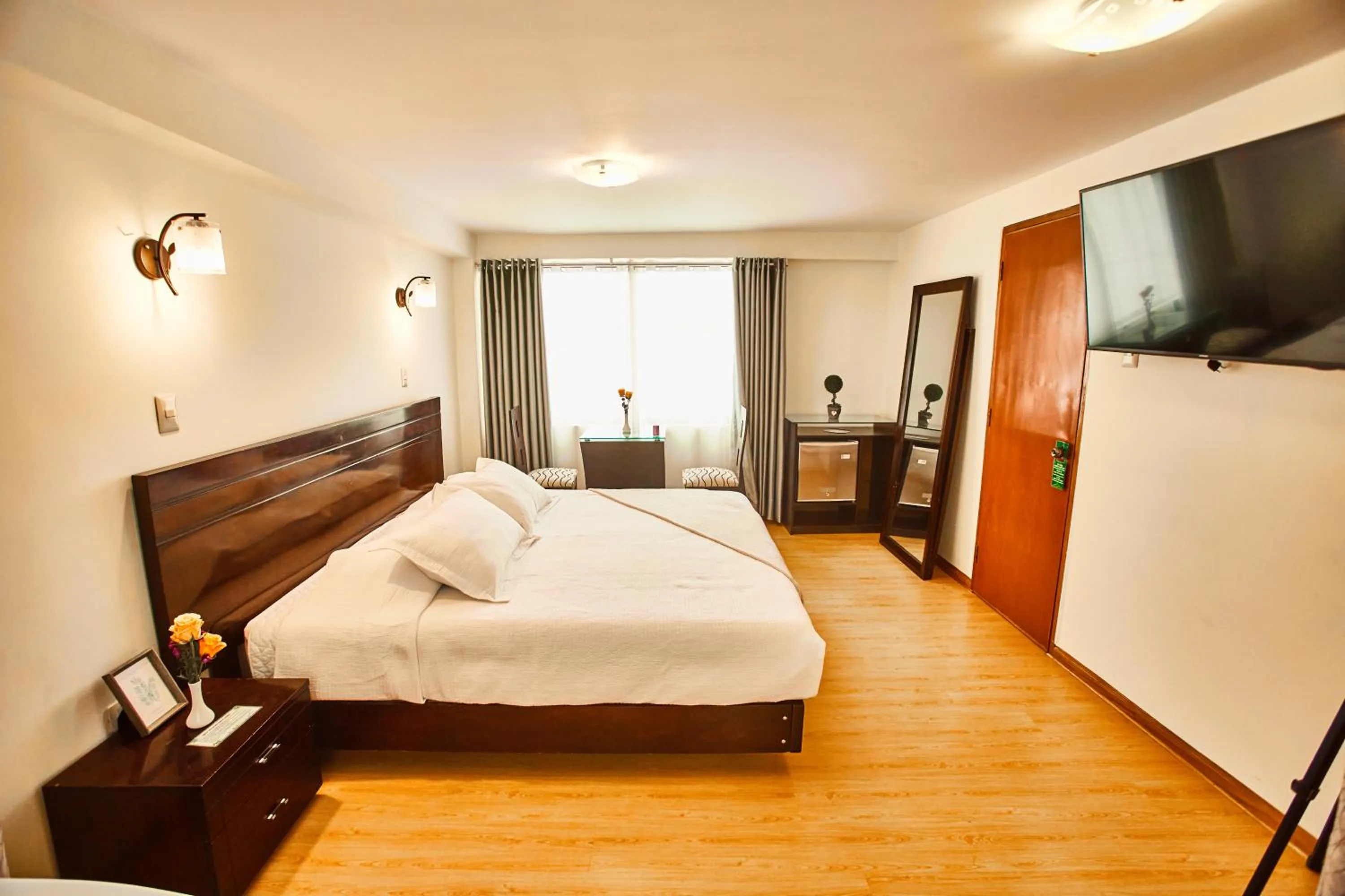 Bed in Inti Tampu Inn