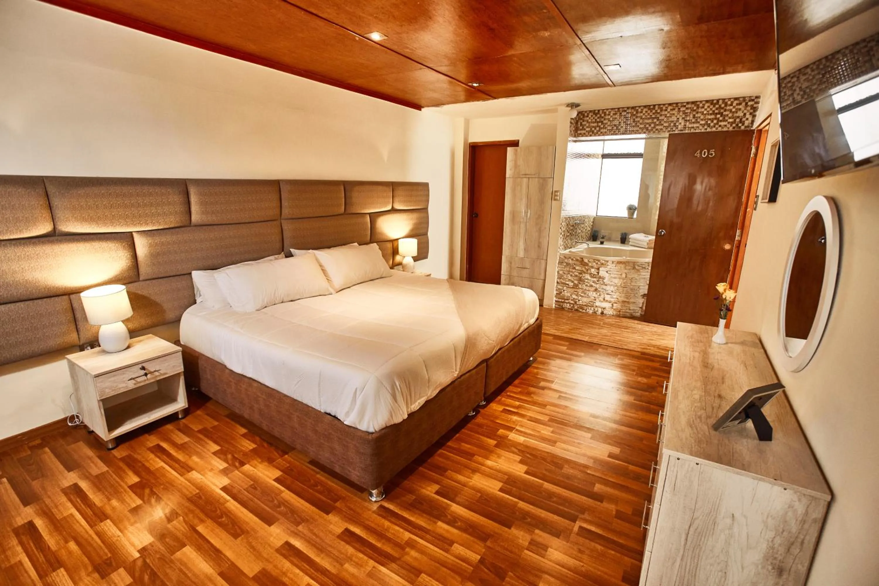 Bed in Inti Tampu Inn