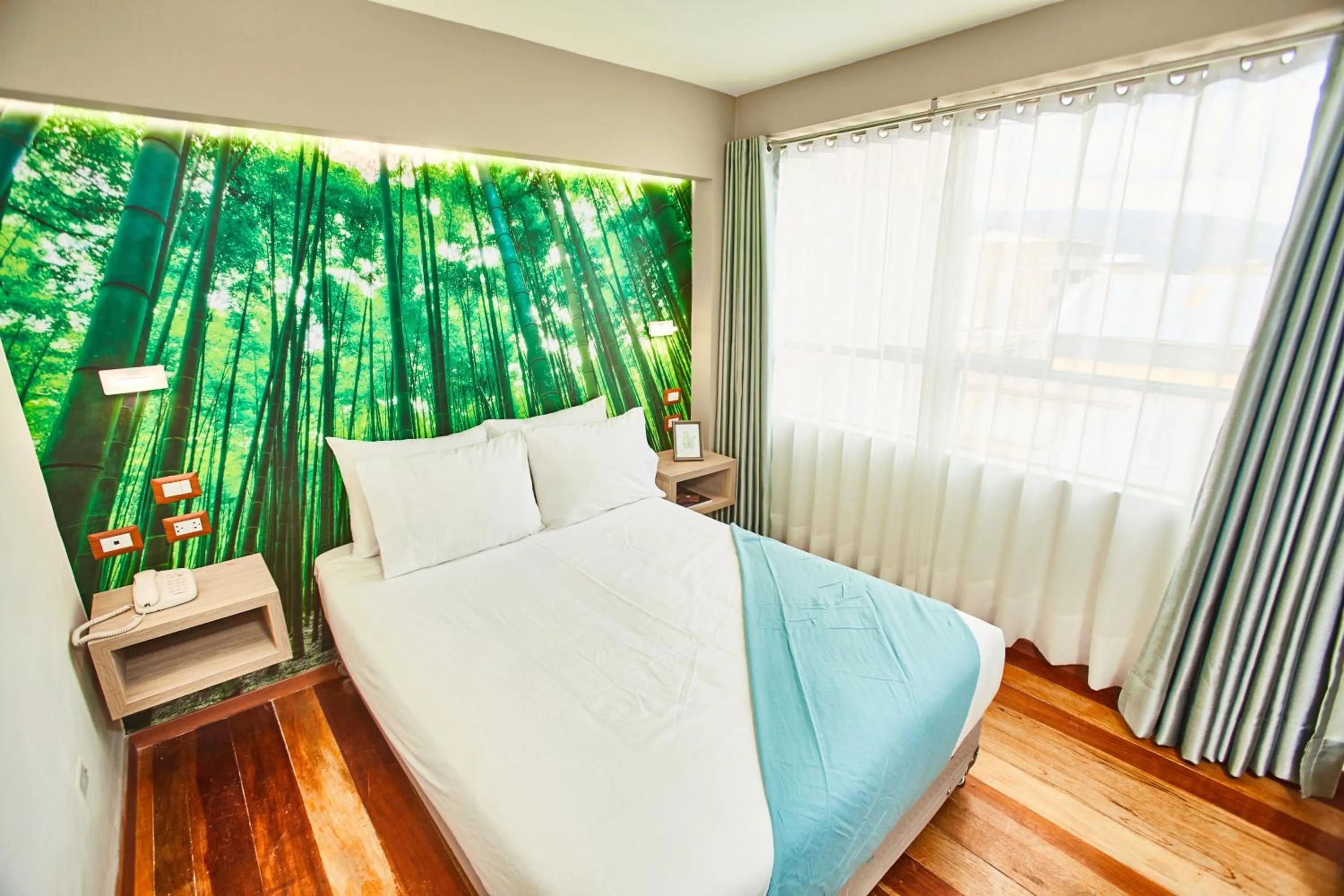 Bed in Inti Tampu Inn