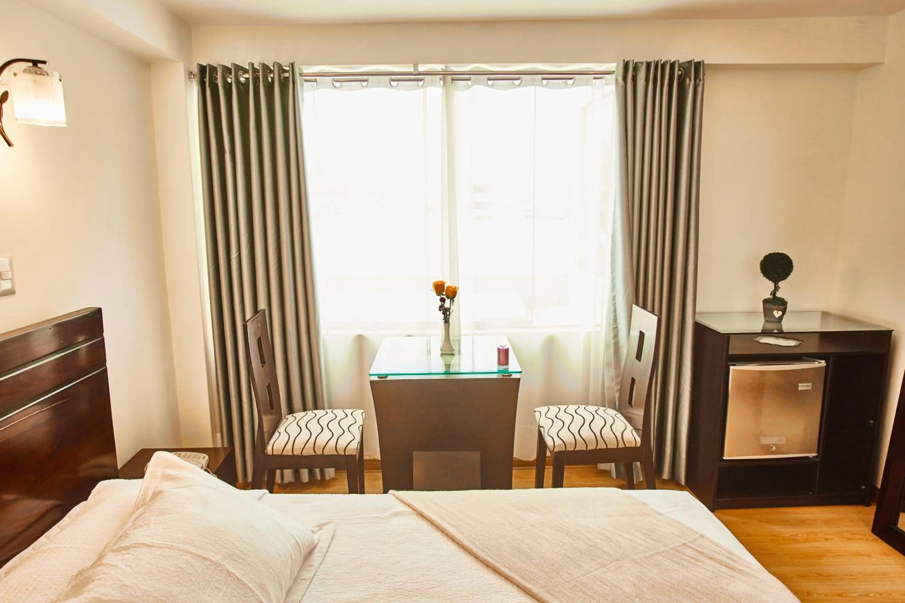 Photo of the whole room, Bed in Inti Tampu Inn