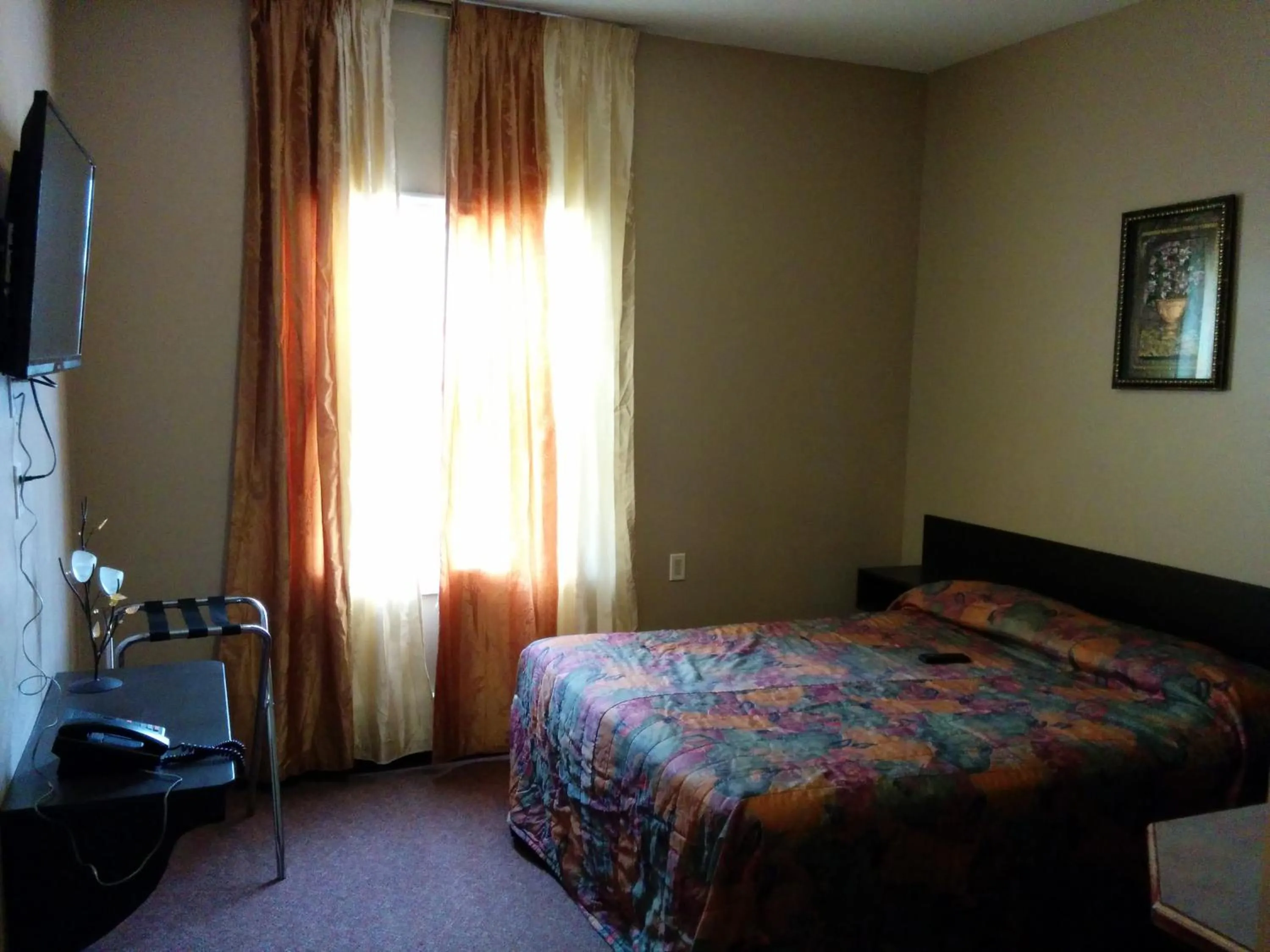 Bed in Bonnyville Hotel