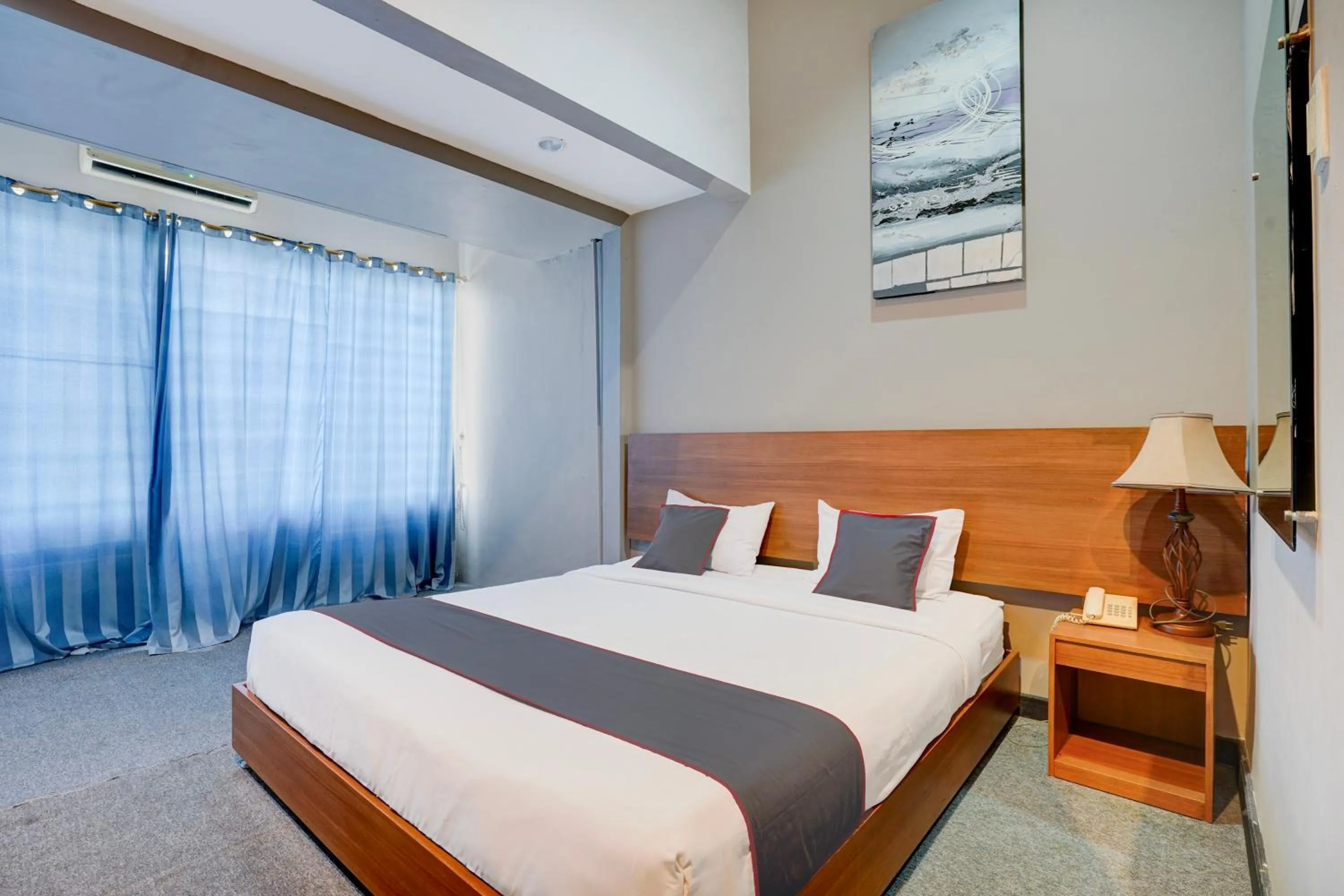 Bed in Collection O Padang near Mesjid Raya Syekh Ahmad Al-Minangkabawi formerly Hotel Surya Palace