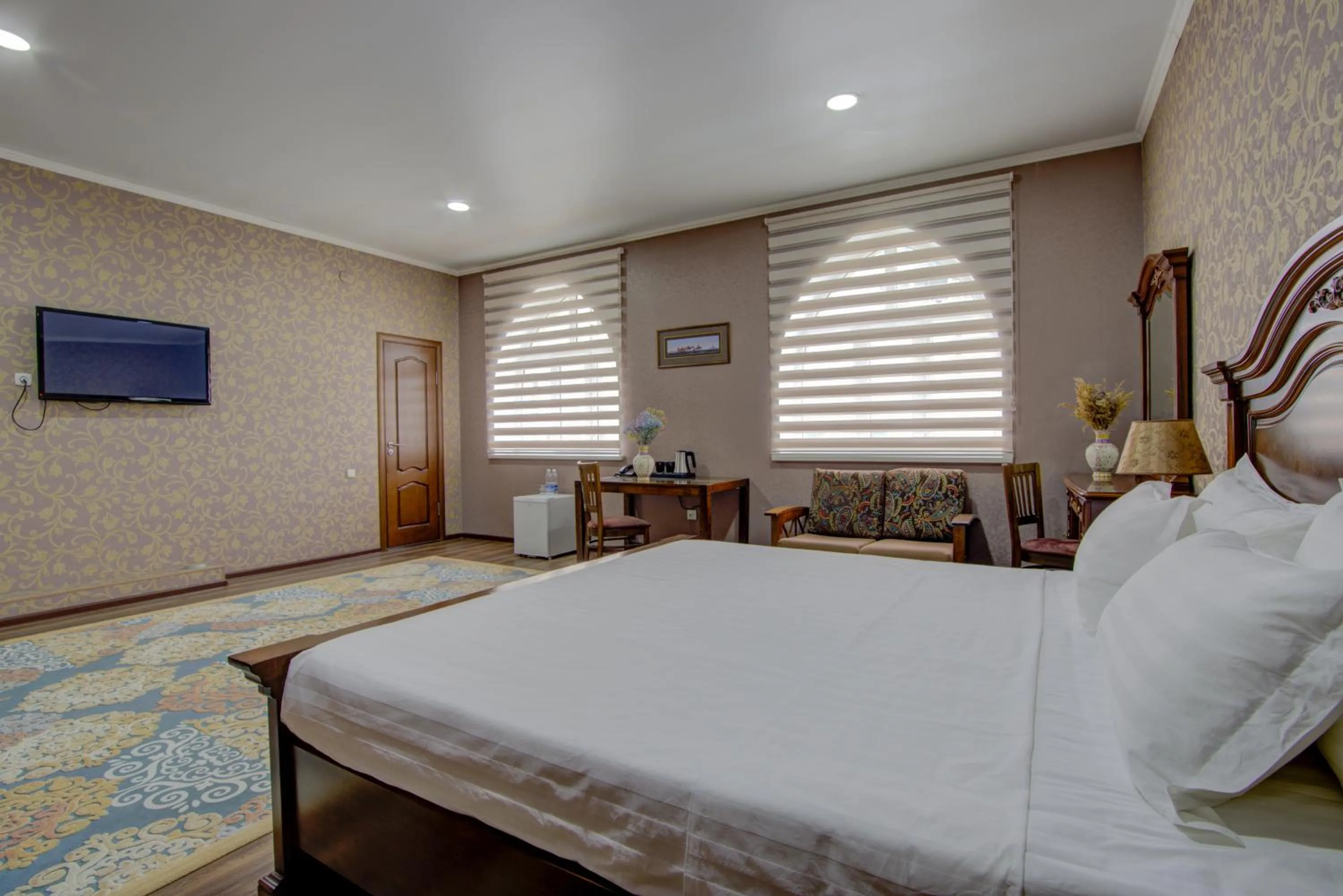 Bed in Shah Palace Hotel