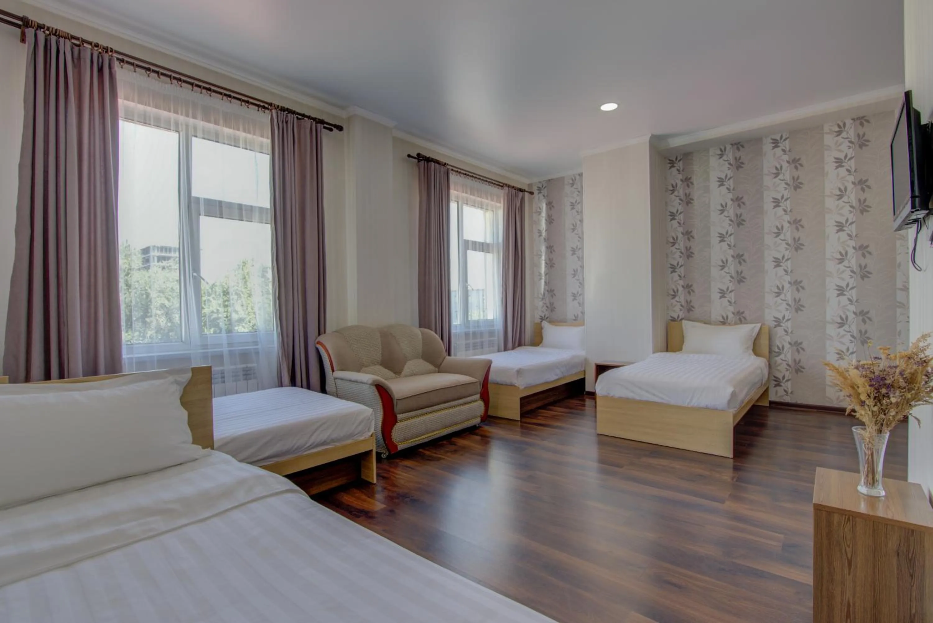 Bed in Shah Palace Hotel