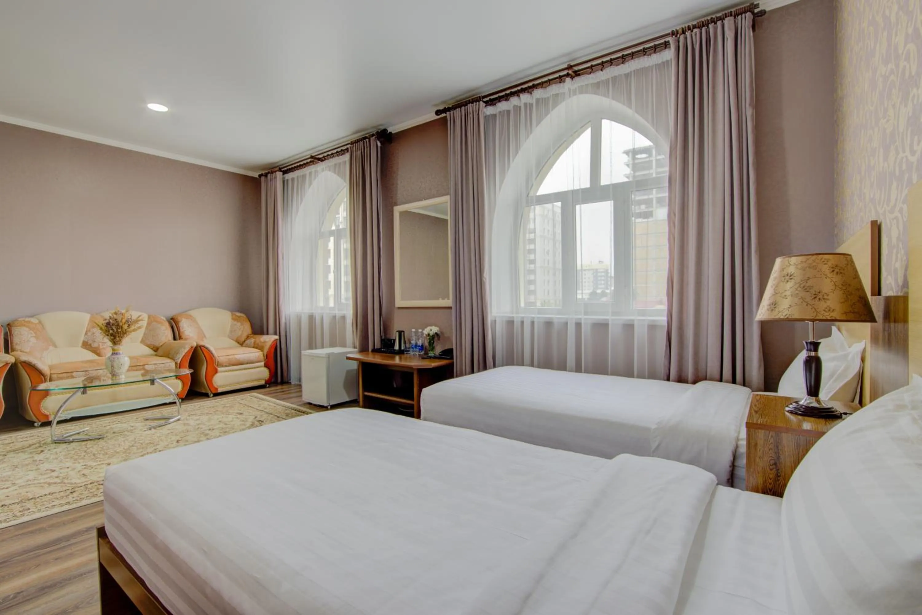 Bed in Shah Palace Hotel