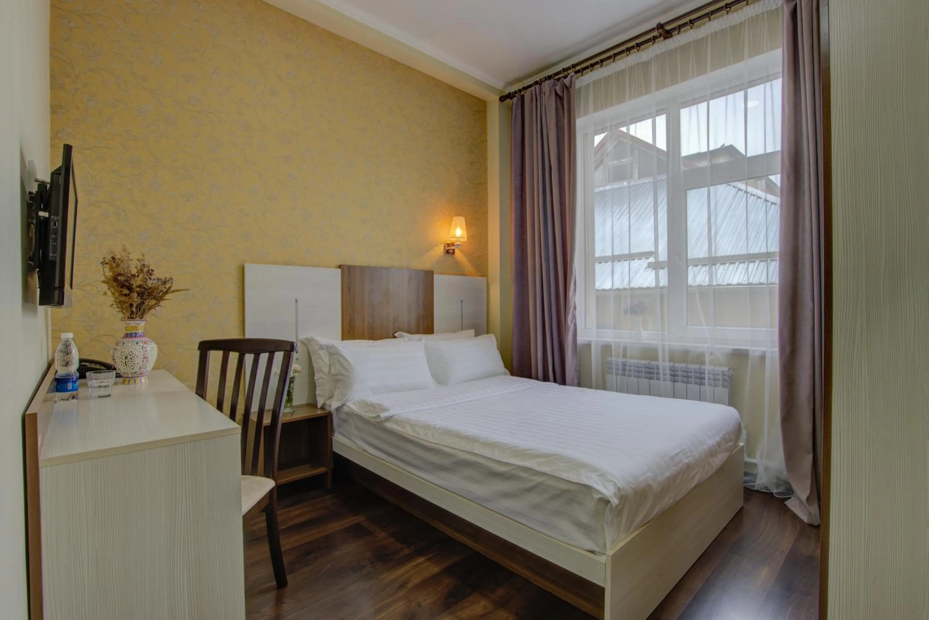 Bed in Shah Palace Hotel