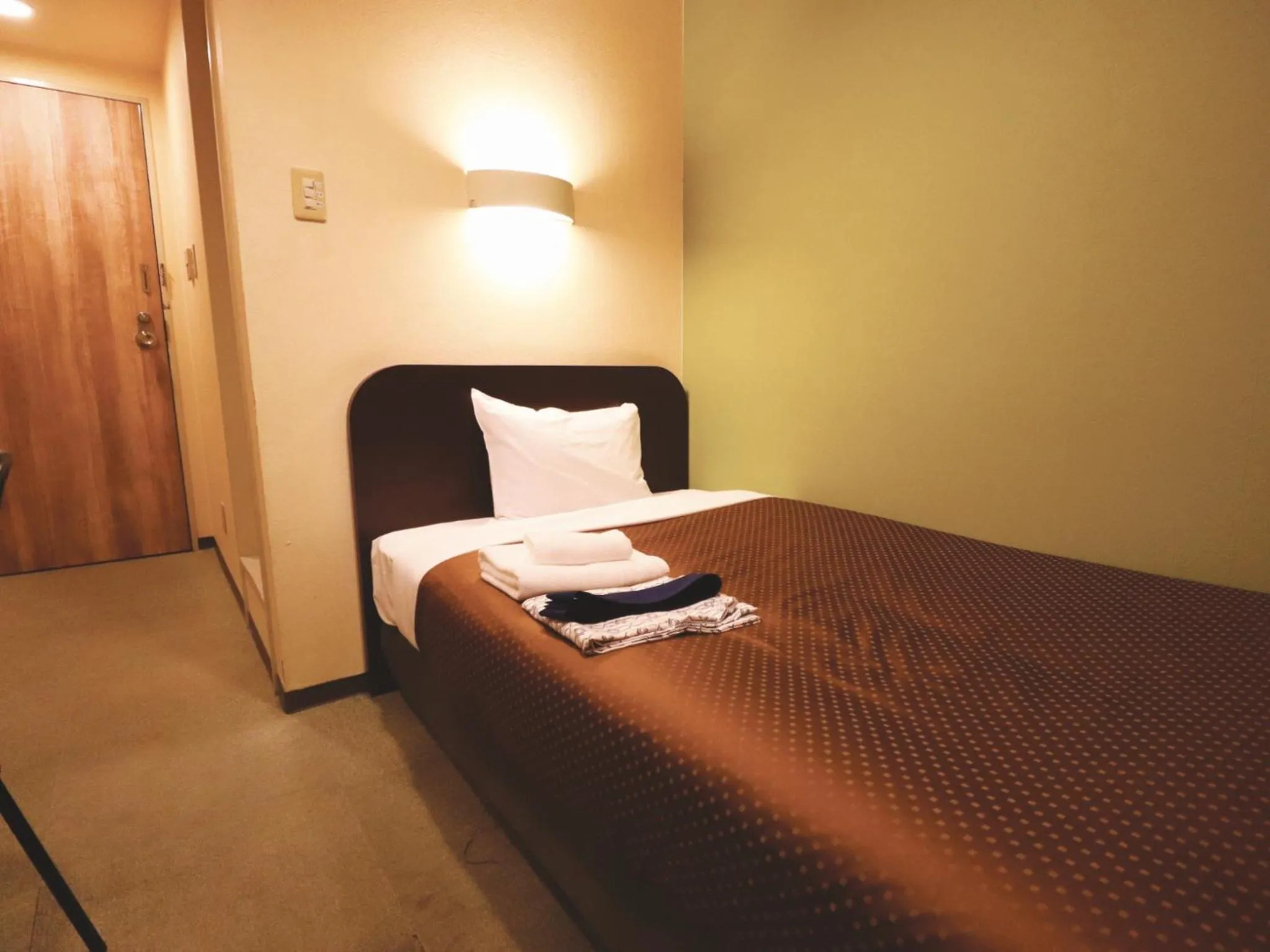 Bed in 米子シティガーデンズホテル Yonago Citygardens Hotel