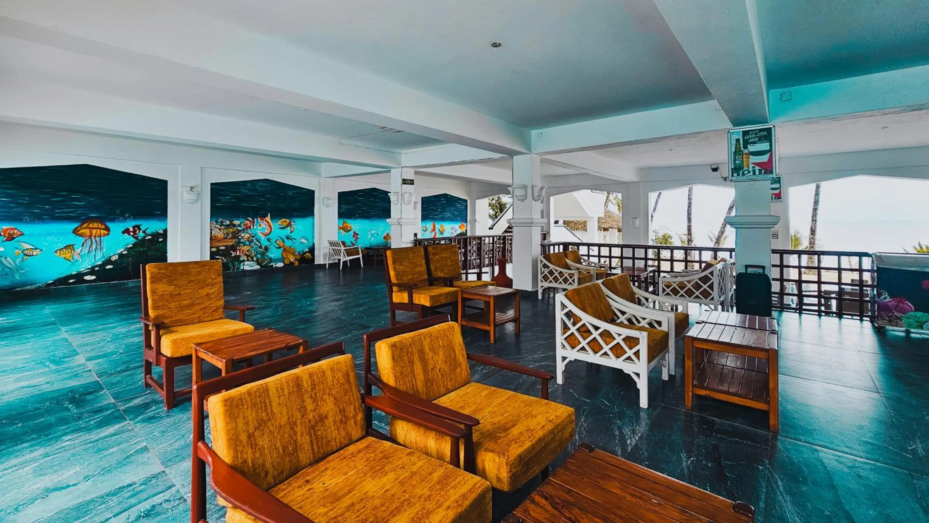 Communal lounge/ TV room in Milele Beach Hotel