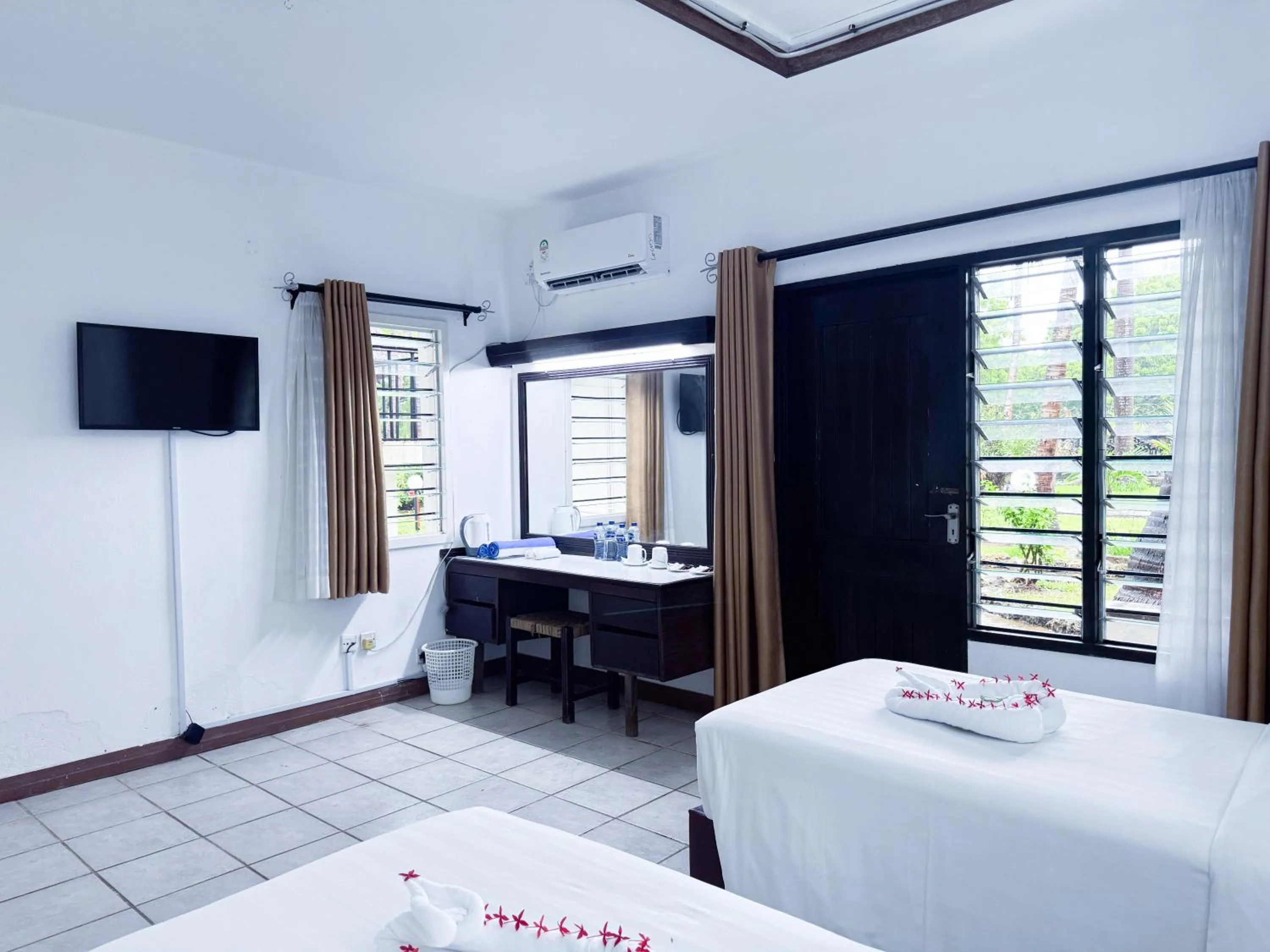 TV and multimedia, Bed in Milele Beach Hotel