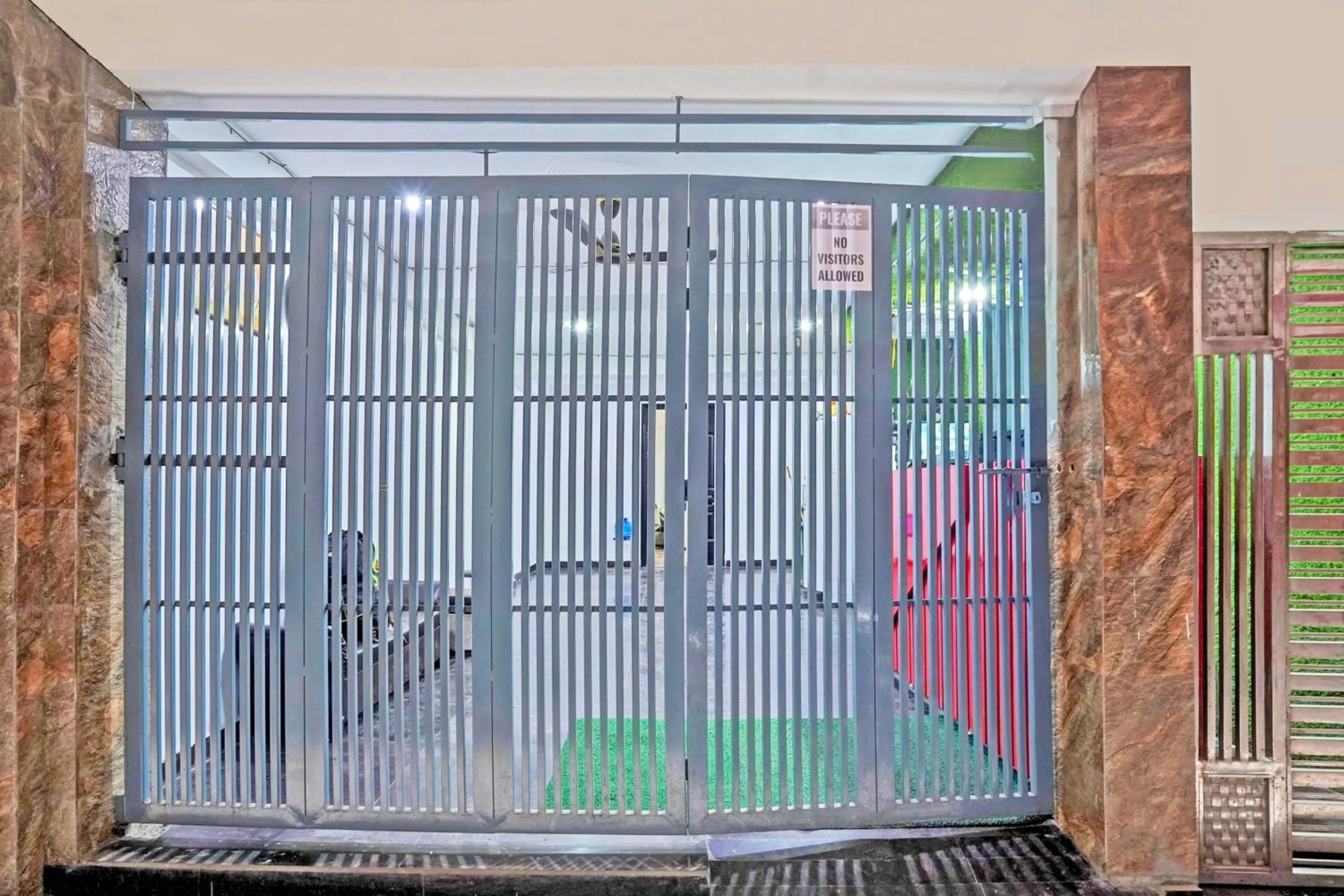 Facade/entrance in Super Hotel O Twamev Residency