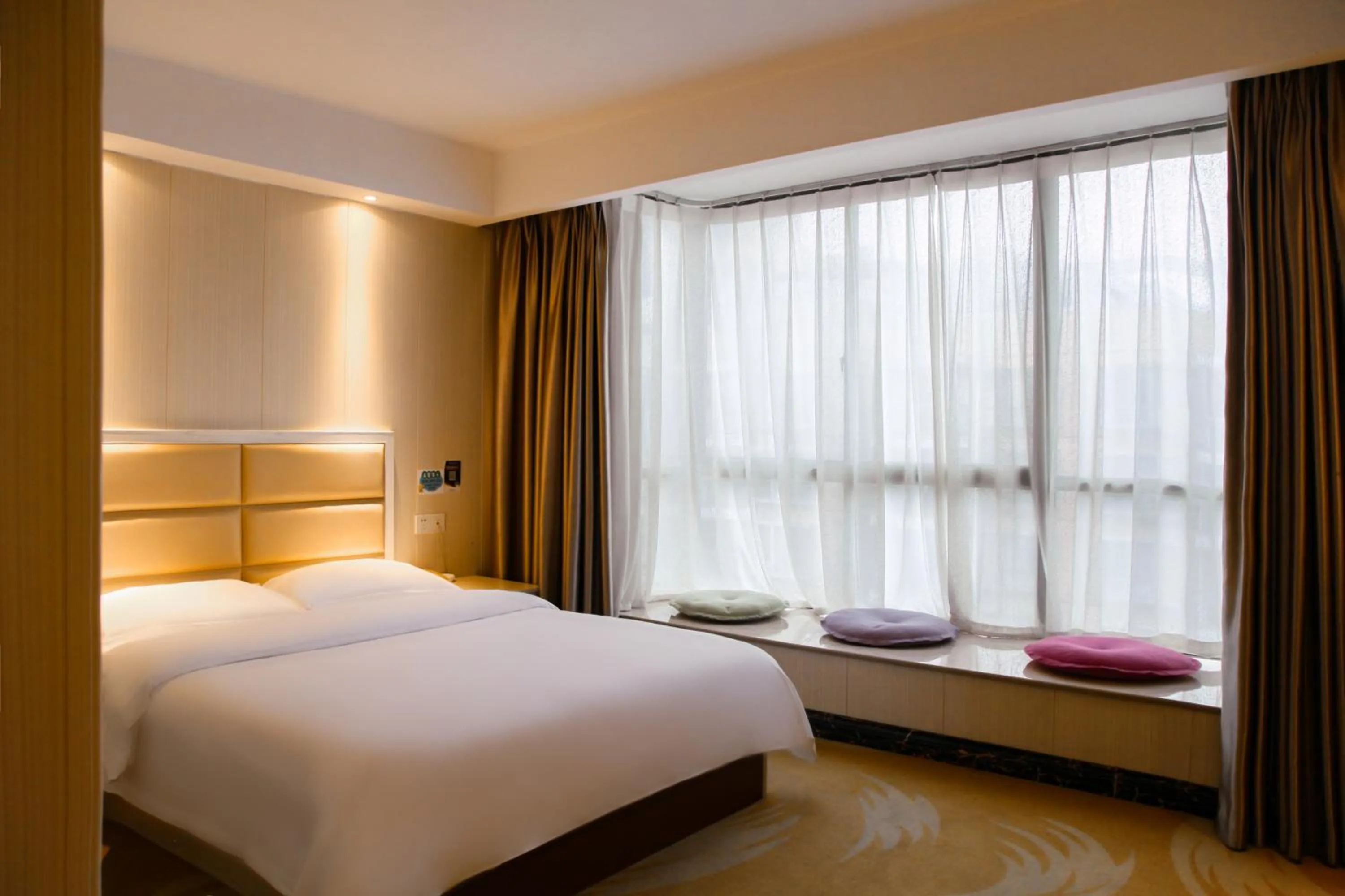 Bed in Century Hotel Tongren