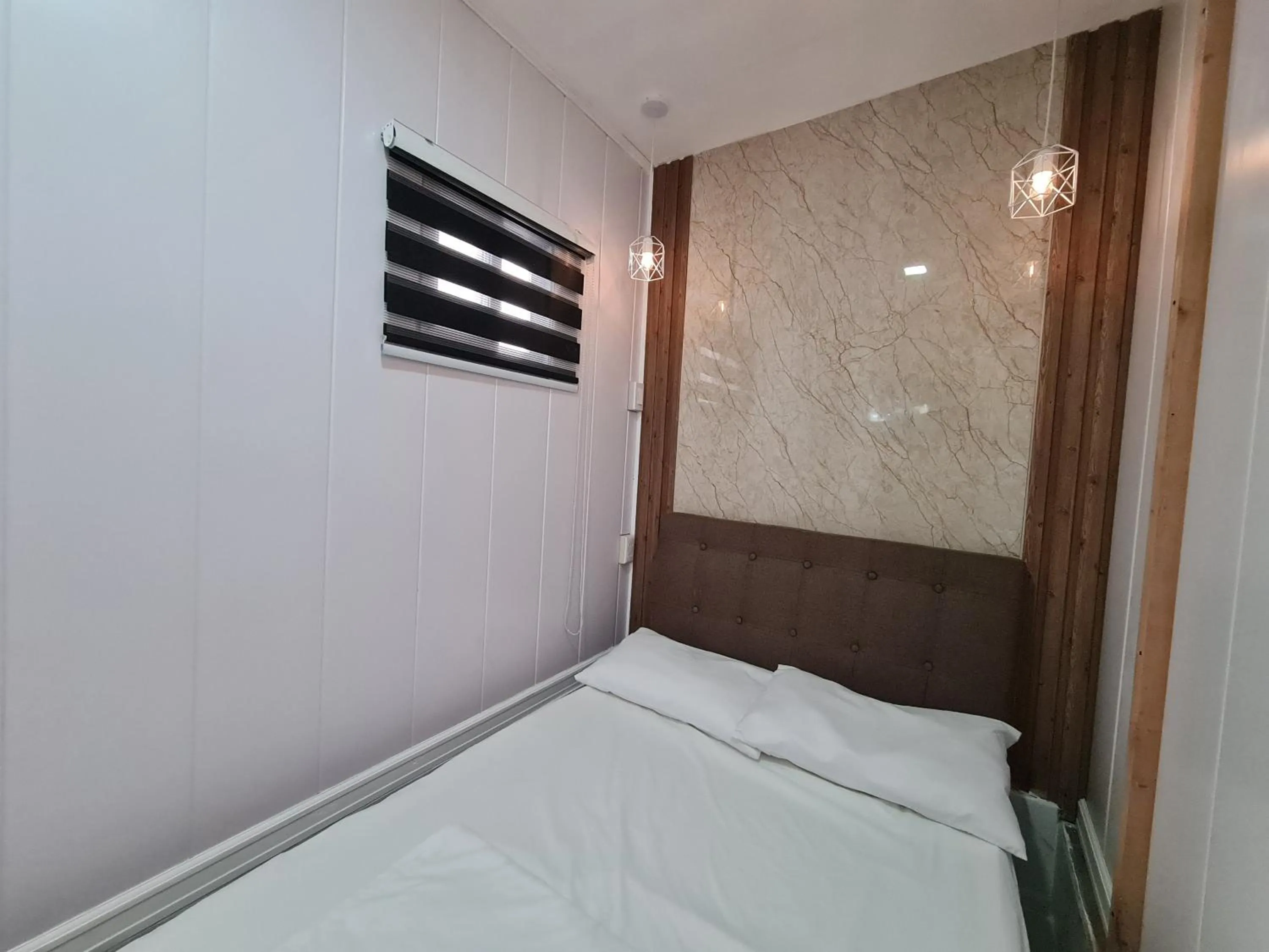 Bed in Dasma Lofts Hotel near Dela Salle Dasma