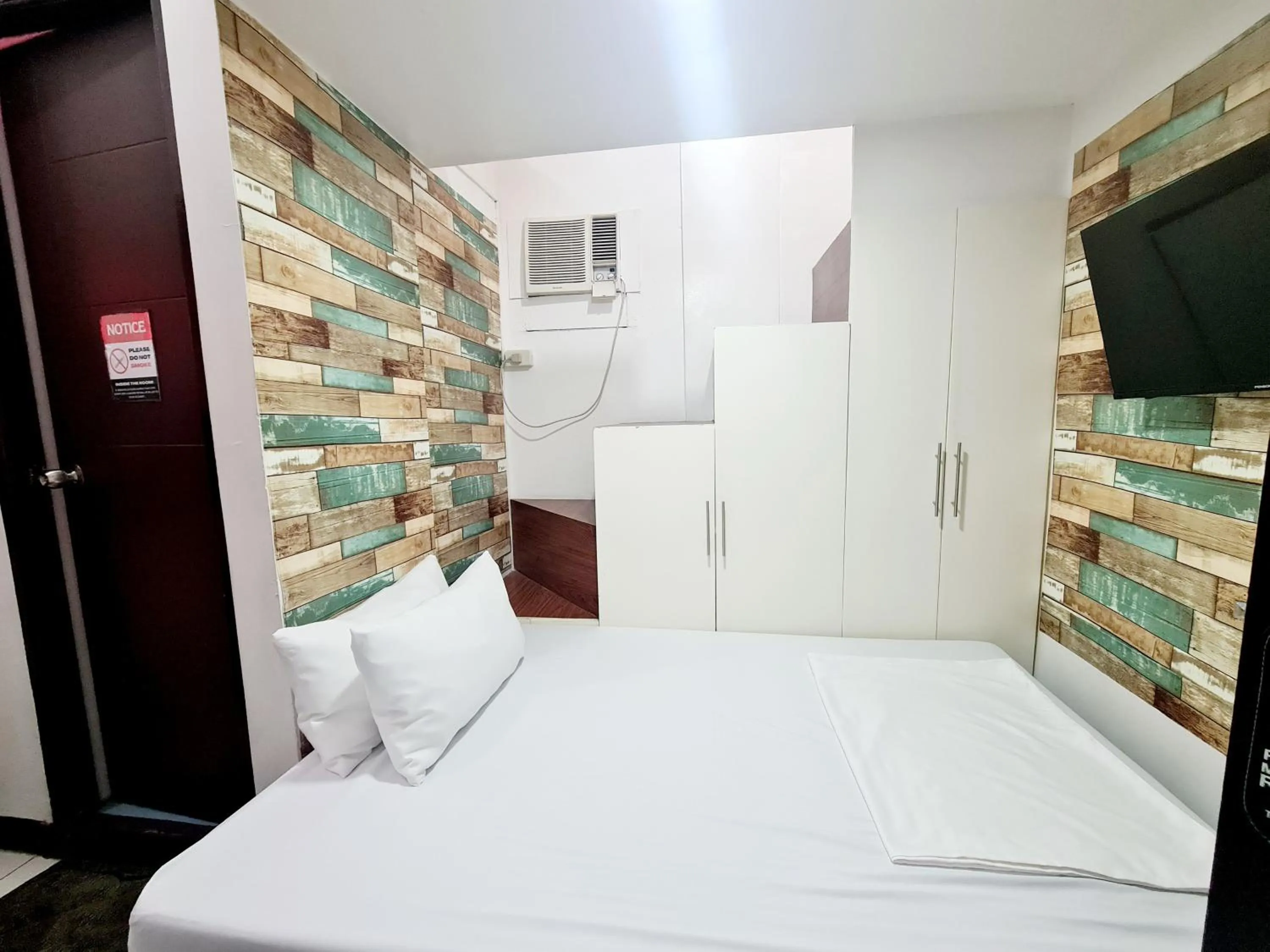 Bed in Dasma Lofts Hotel near Dela Salle Dasma