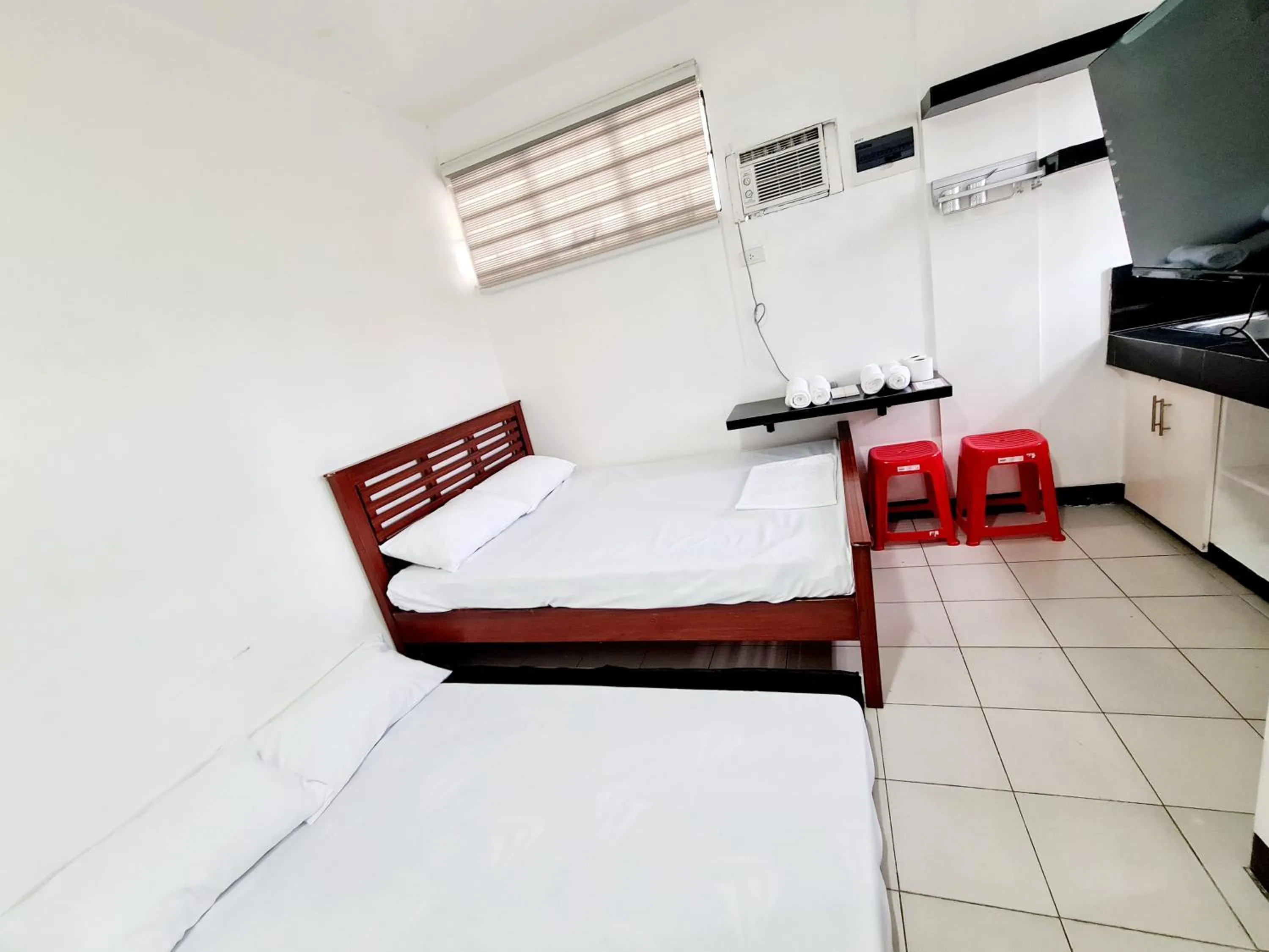 Bed in Dasma Lofts Hotel near Dela Salle Dasma