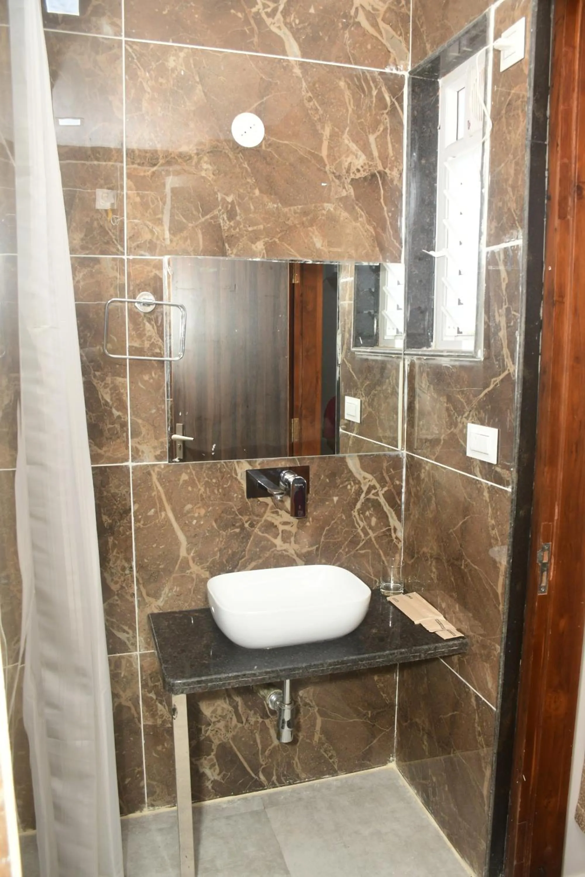 Bathroom in Kankidham Lords Inn