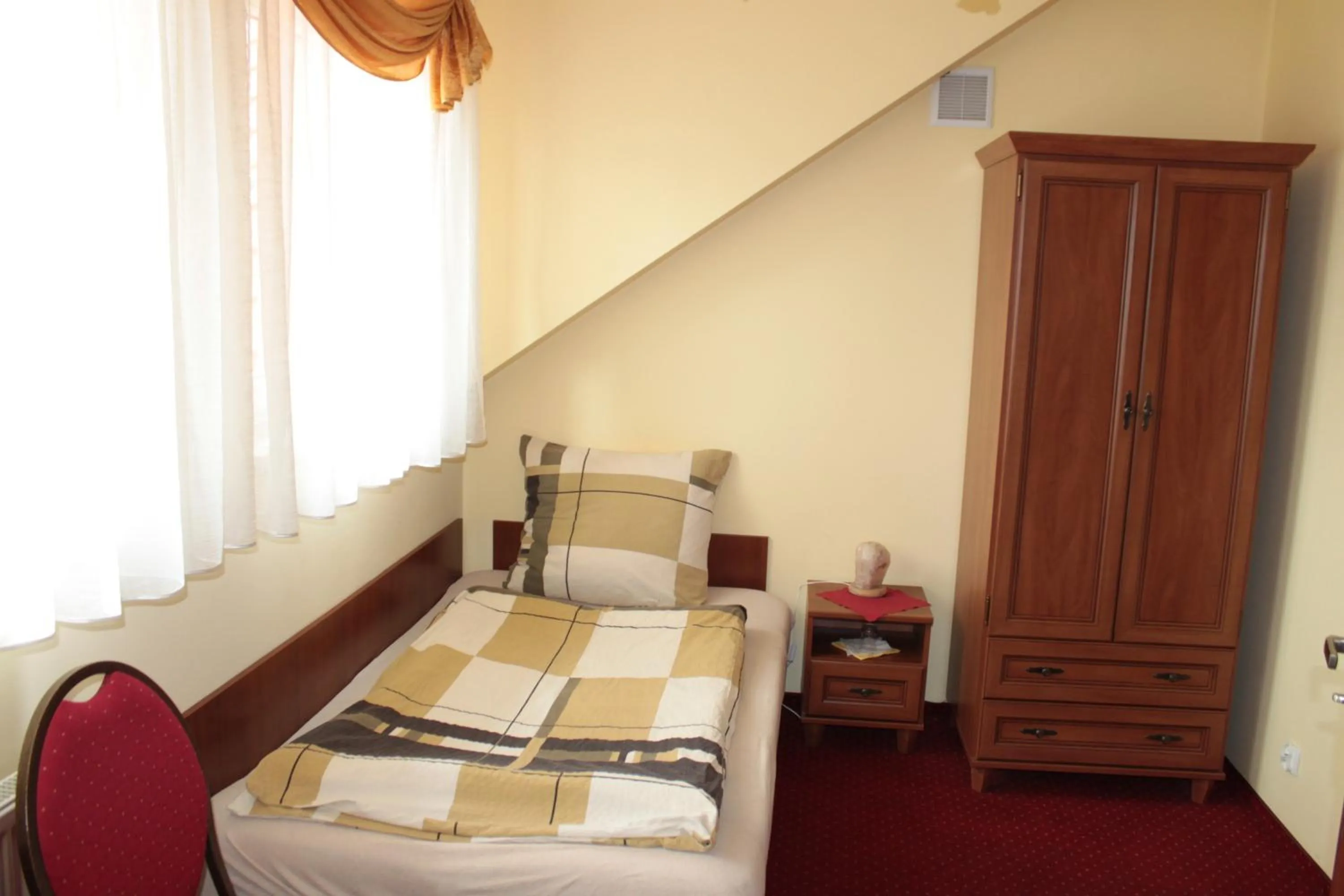 Bed in Zajazd Skorpion B&B