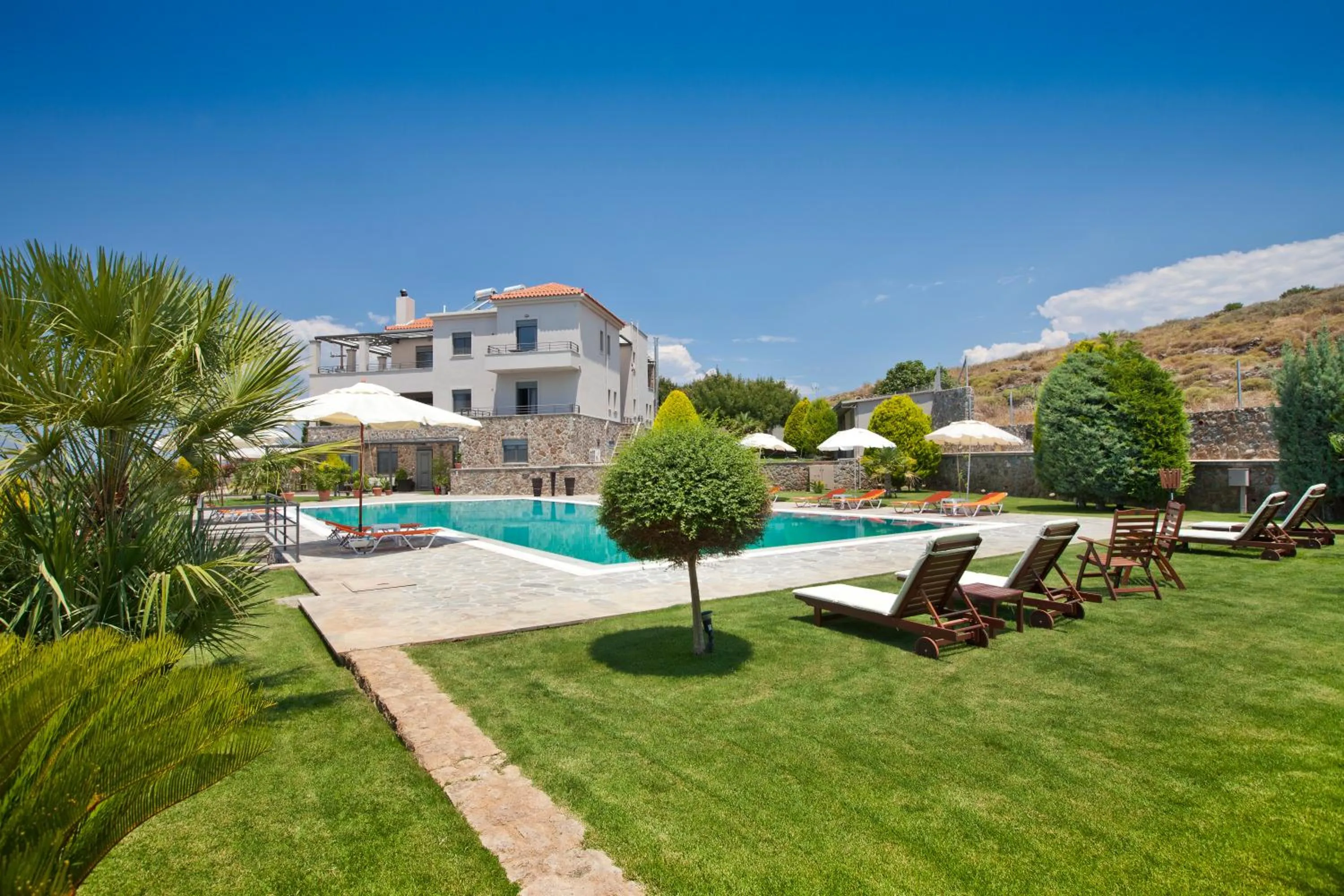 Swimming pool in Marini Luxury Apartments and Suites