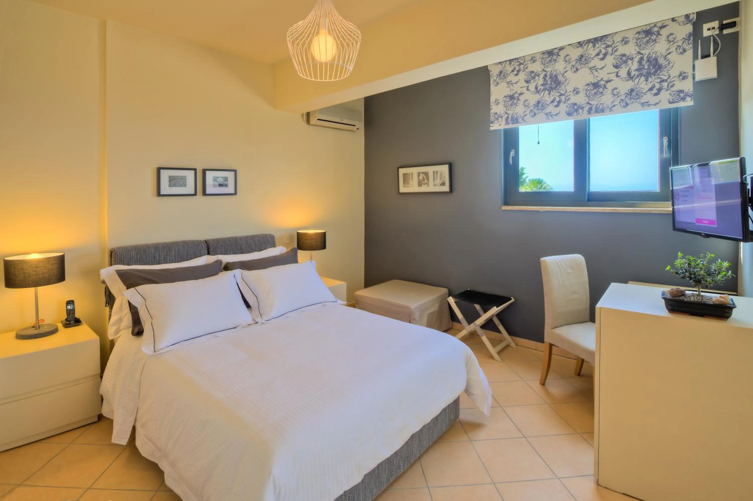 Bedroom in Marini Luxury Apartments and Suites