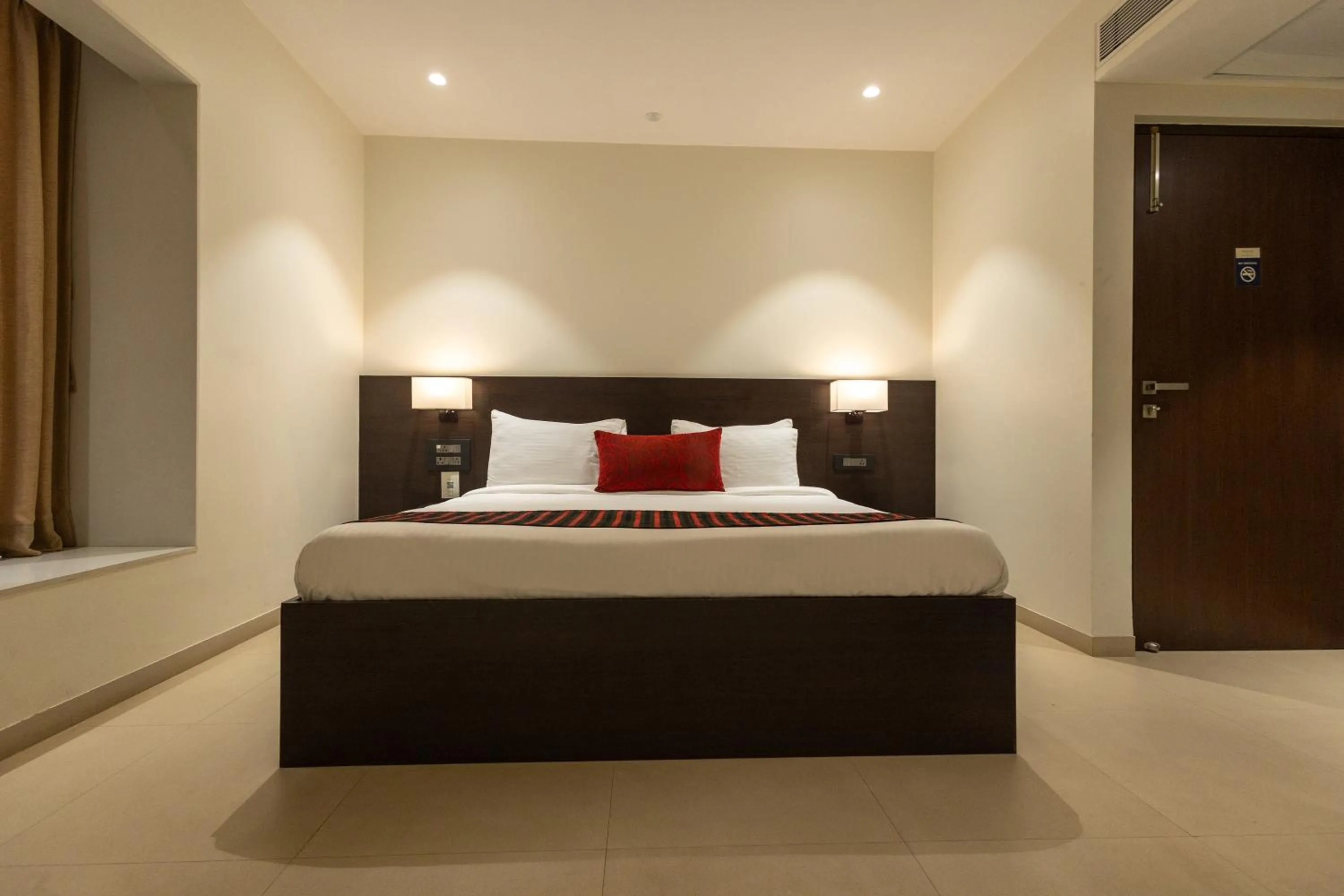 Bed in Freesia Residency by Express Inn