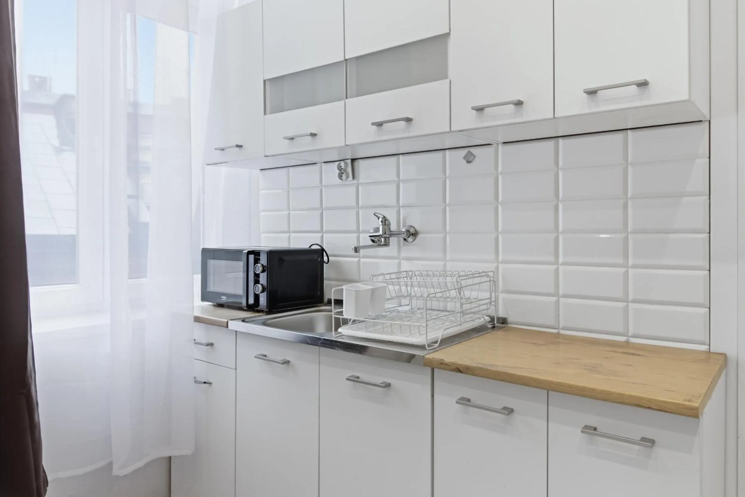 Kitchen or kitchenette in 70s Hostel