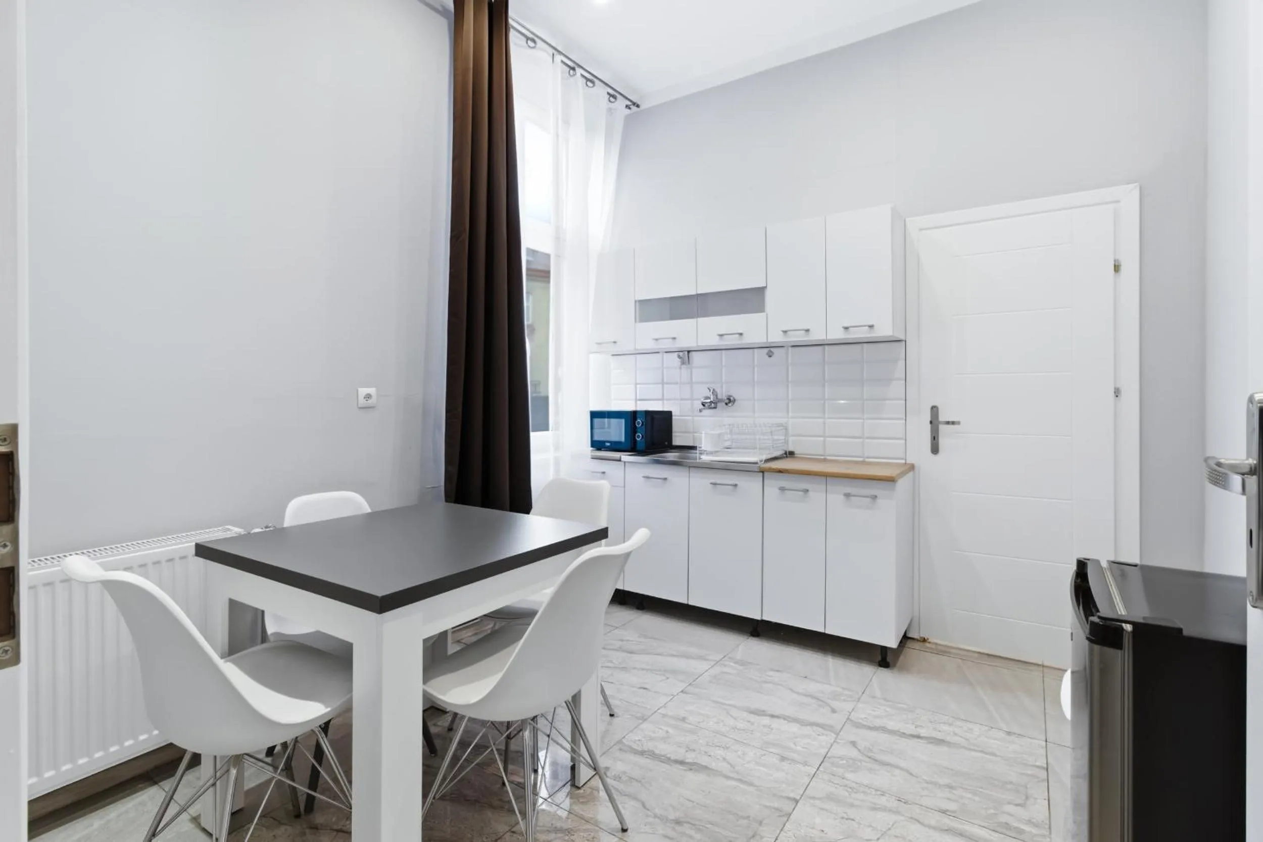 Kitchen or kitchenette in 70s Hostel