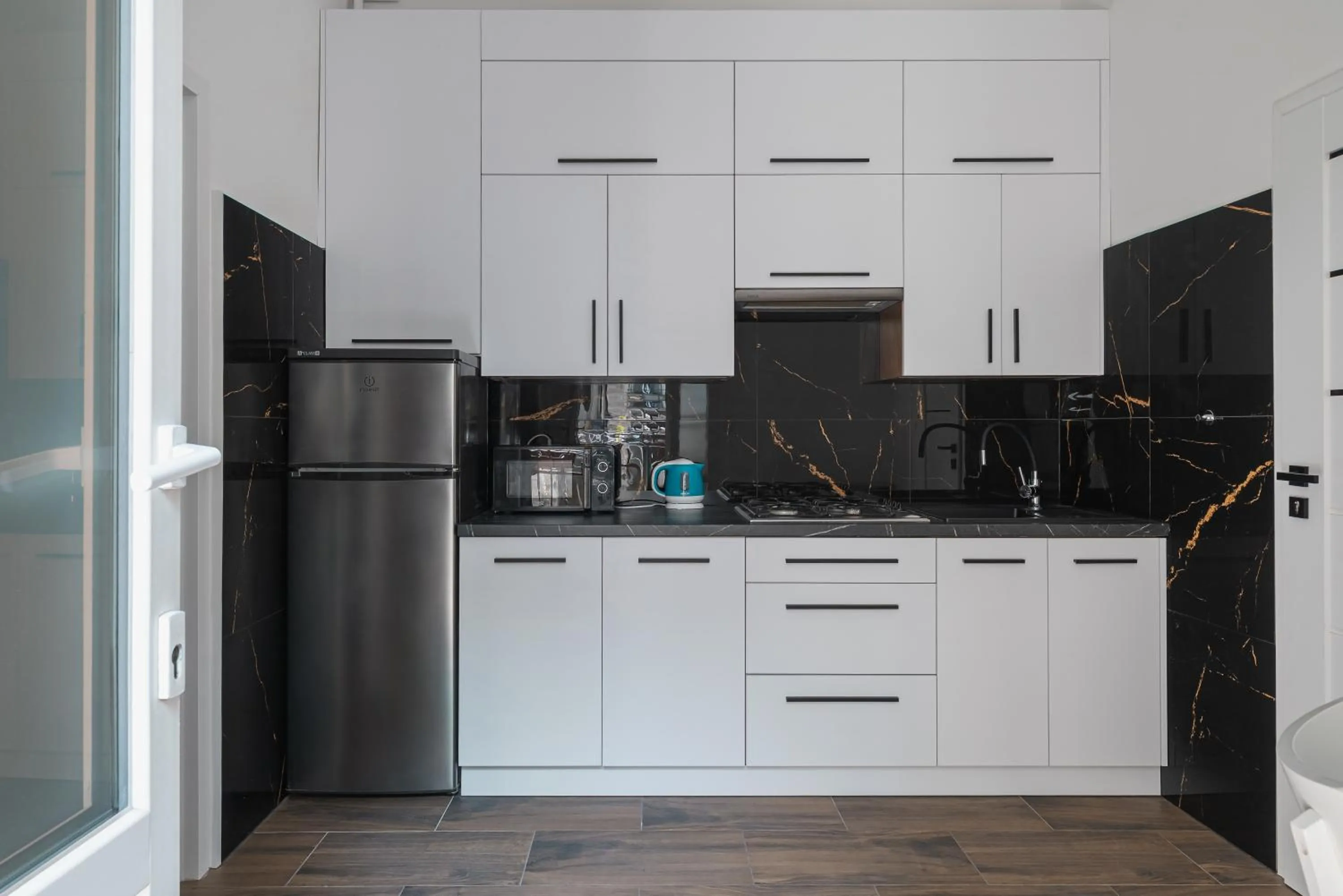 Kitchen or kitchenette in 70s Hostel