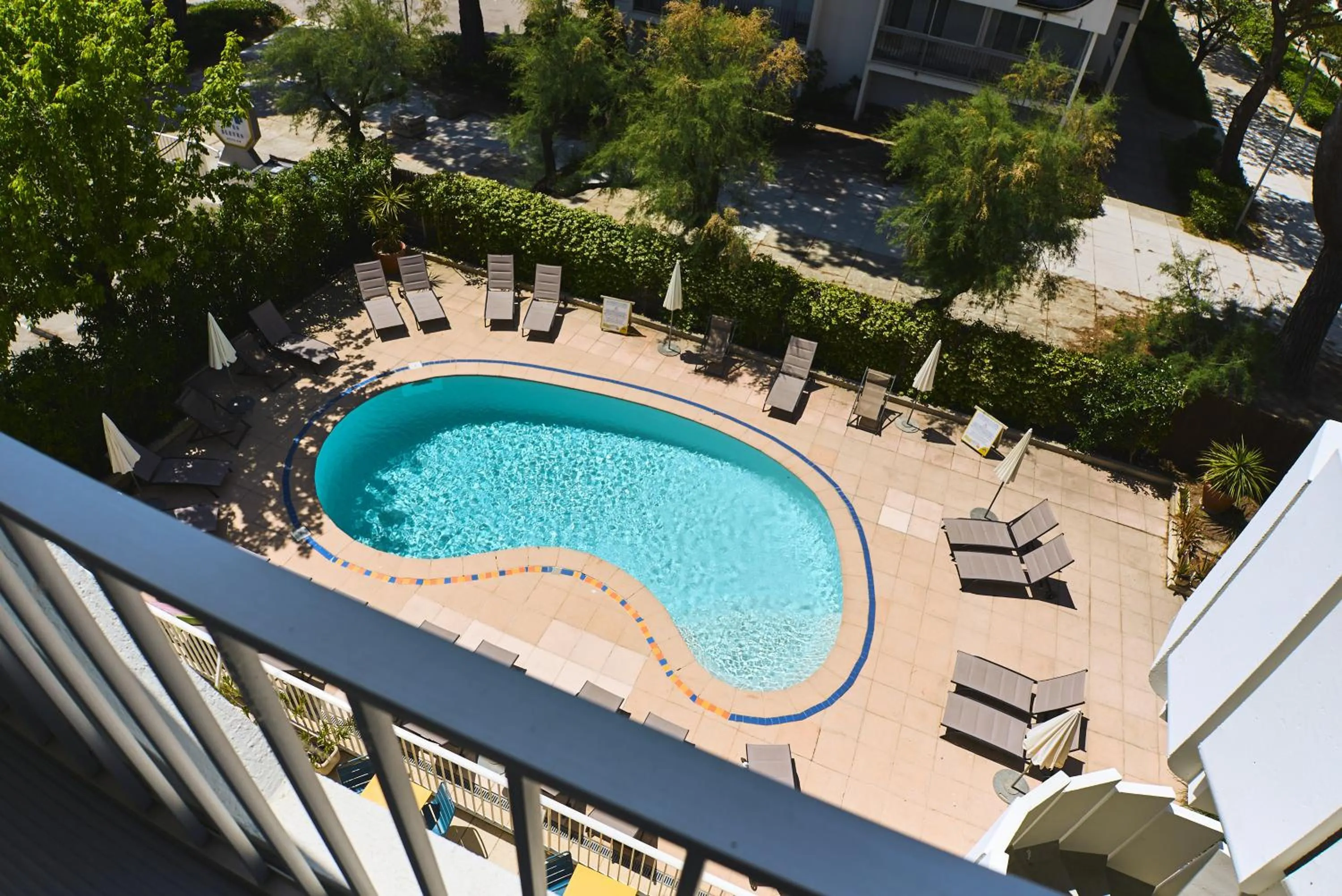 Swimming pool in Hôtel Les Rives Bleues