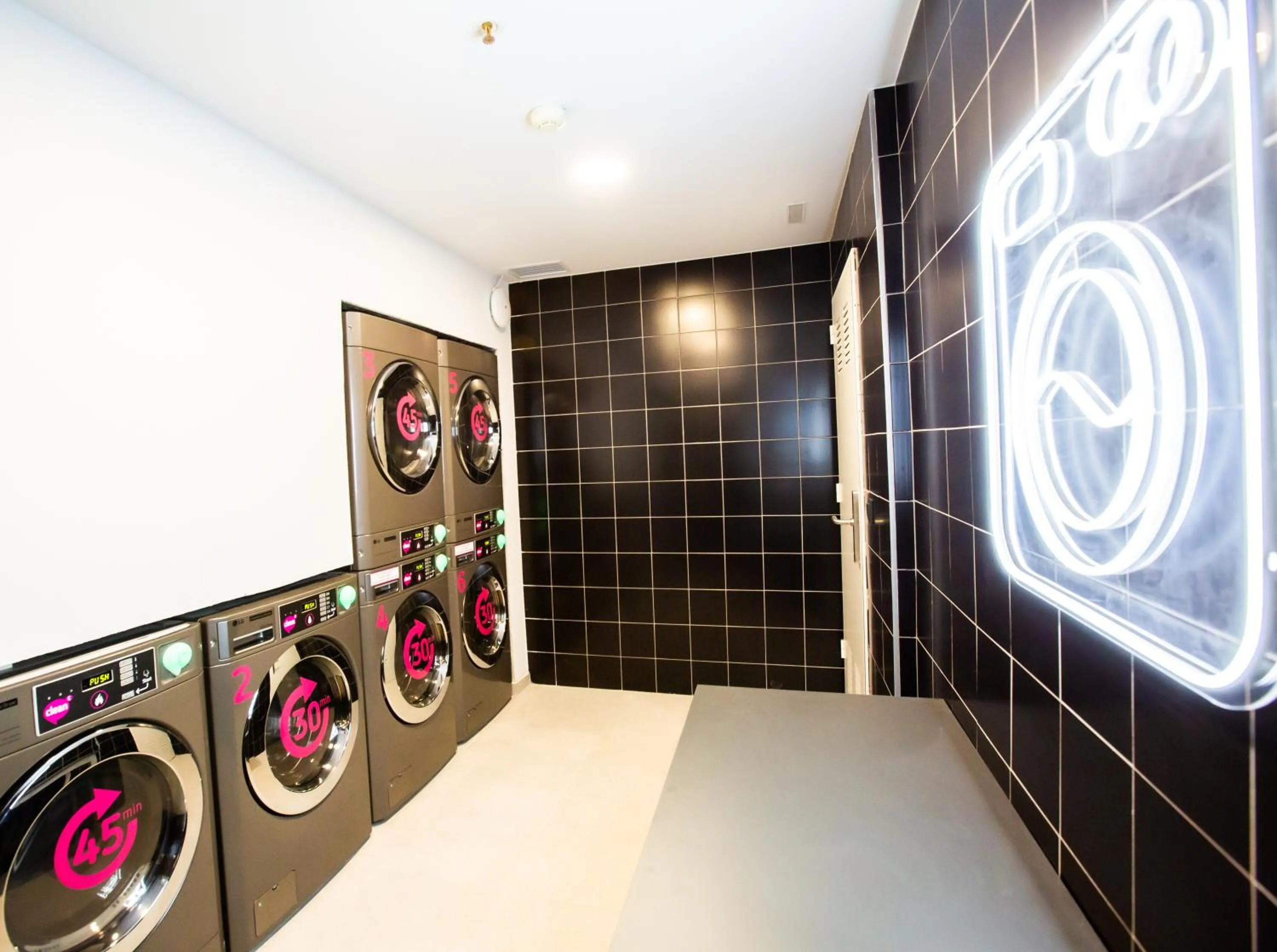 washing machine in Micampus Burjassot Parque Student Residence