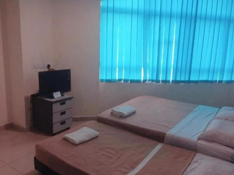 Bed in Semerah Suites Homestay