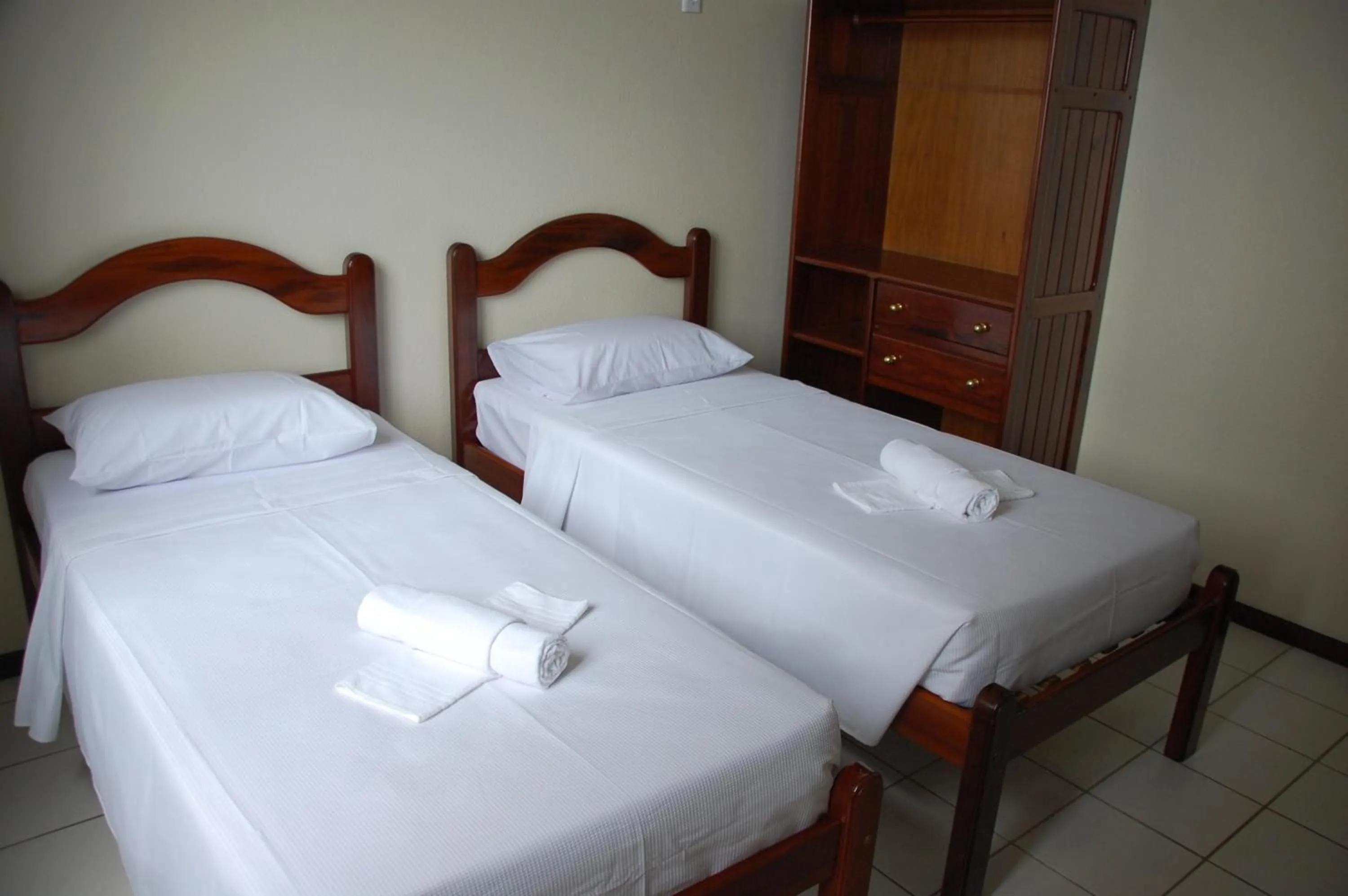 Bed in Netuno Beach Hotel