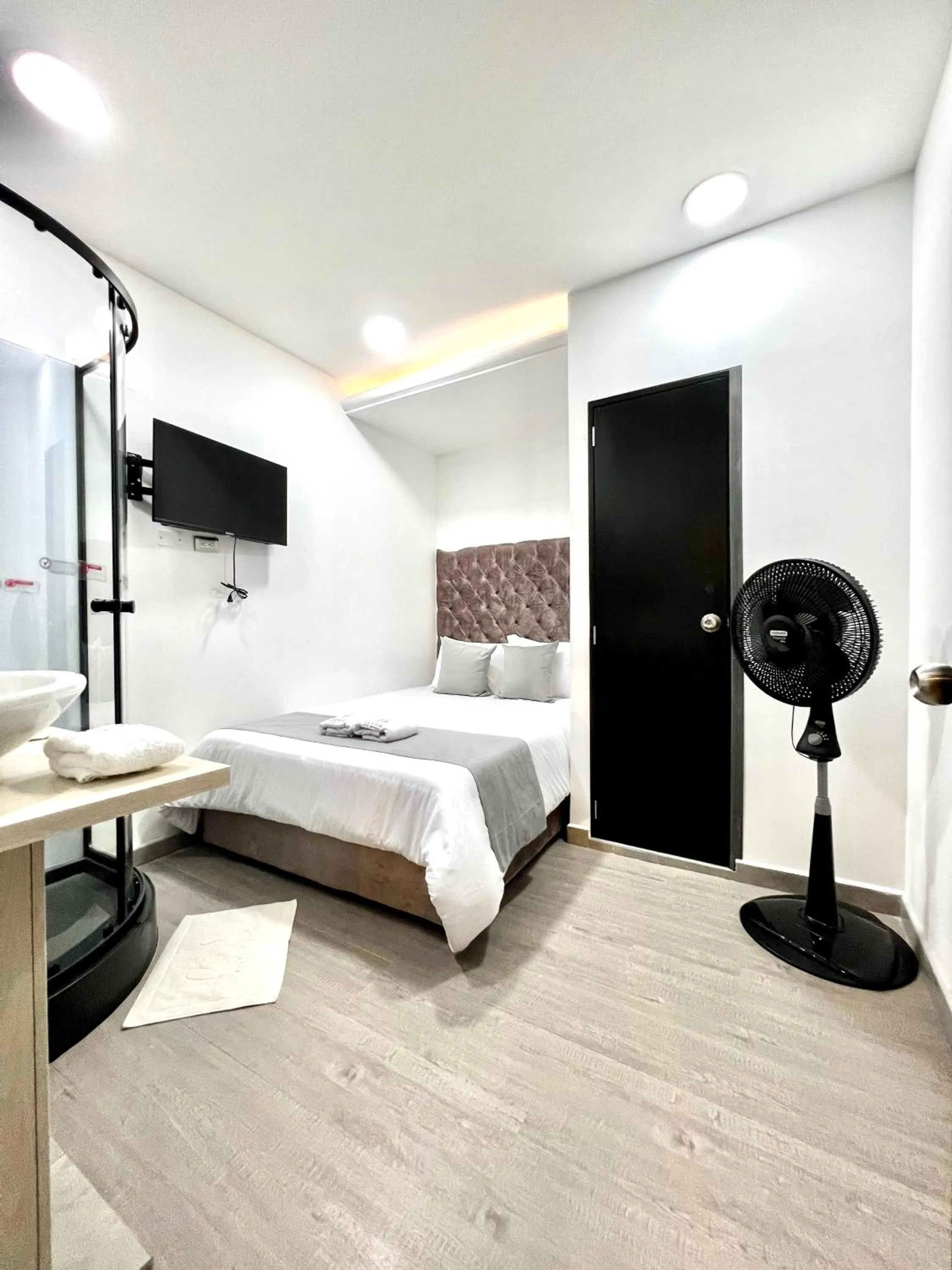 Photo of the whole room, Bed in Orbe Hotel Medellín