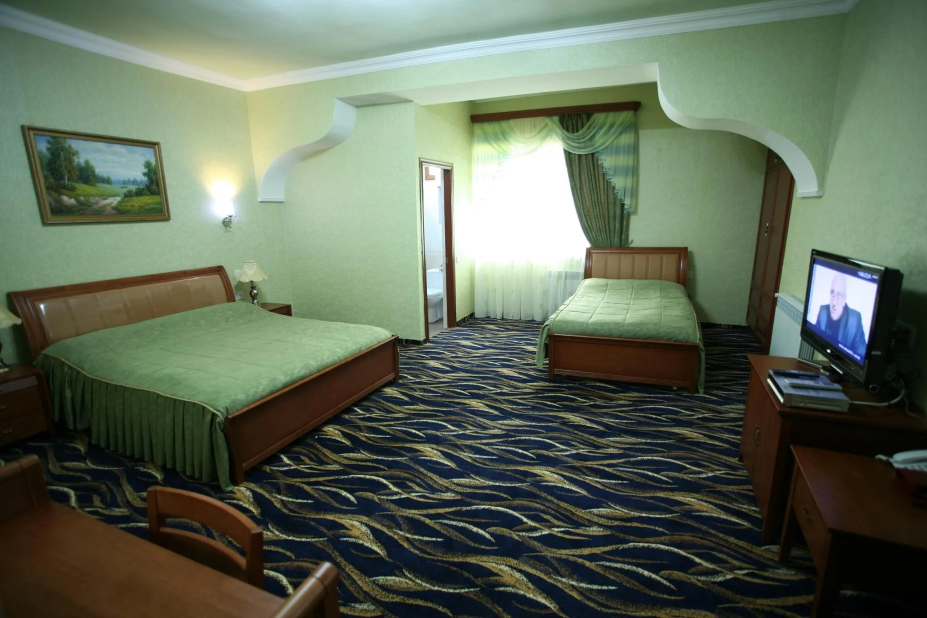 Bed in Nairi Hotel