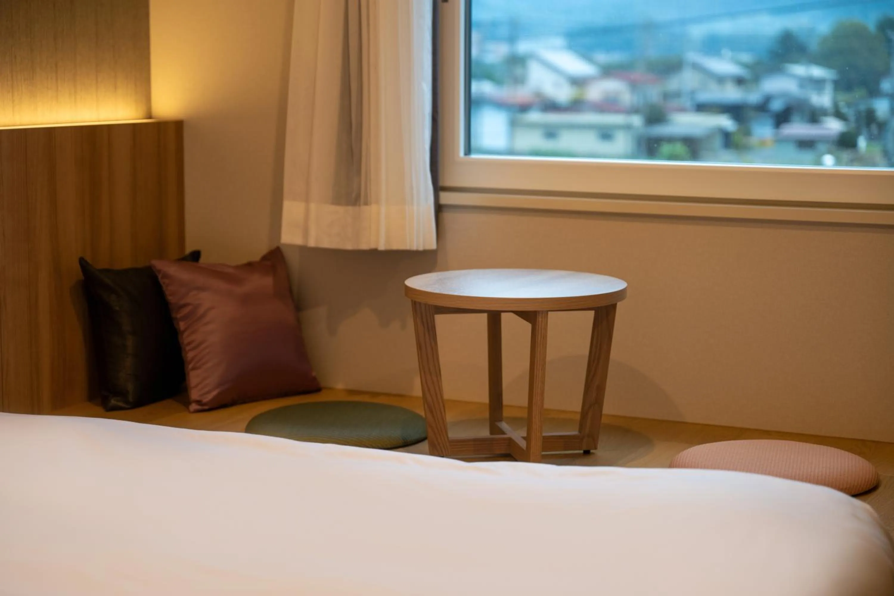 Bed in SAKURA PORT HOTEL