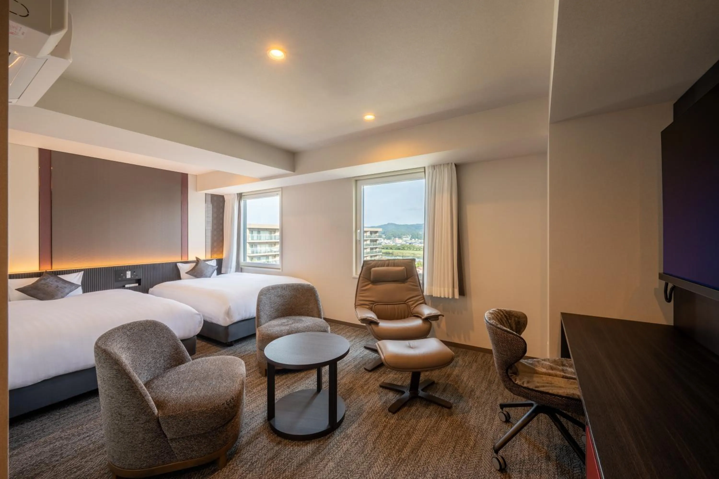 Bed in SAKURA PORT HOTEL