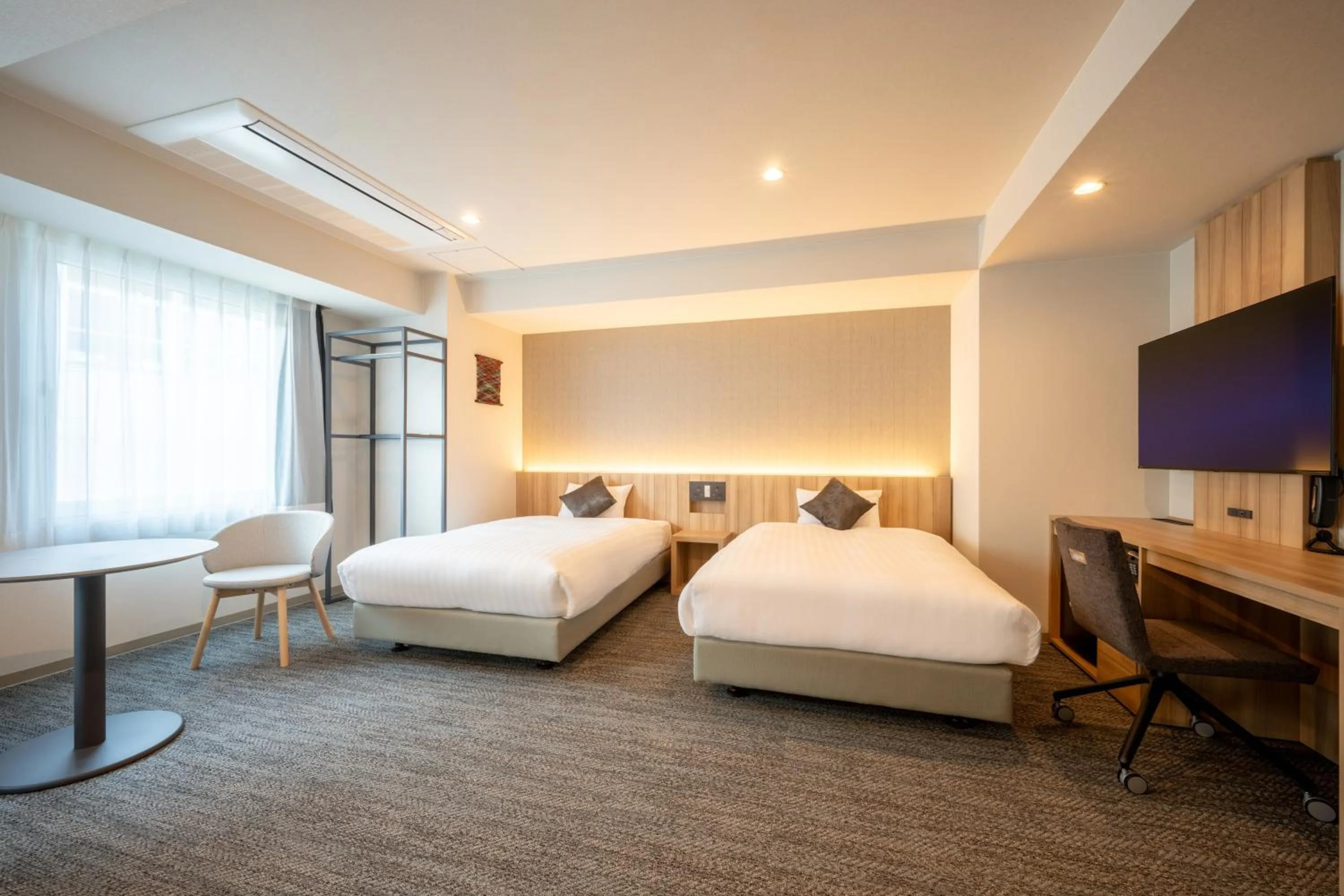 Bed in SAKURA PORT HOTEL