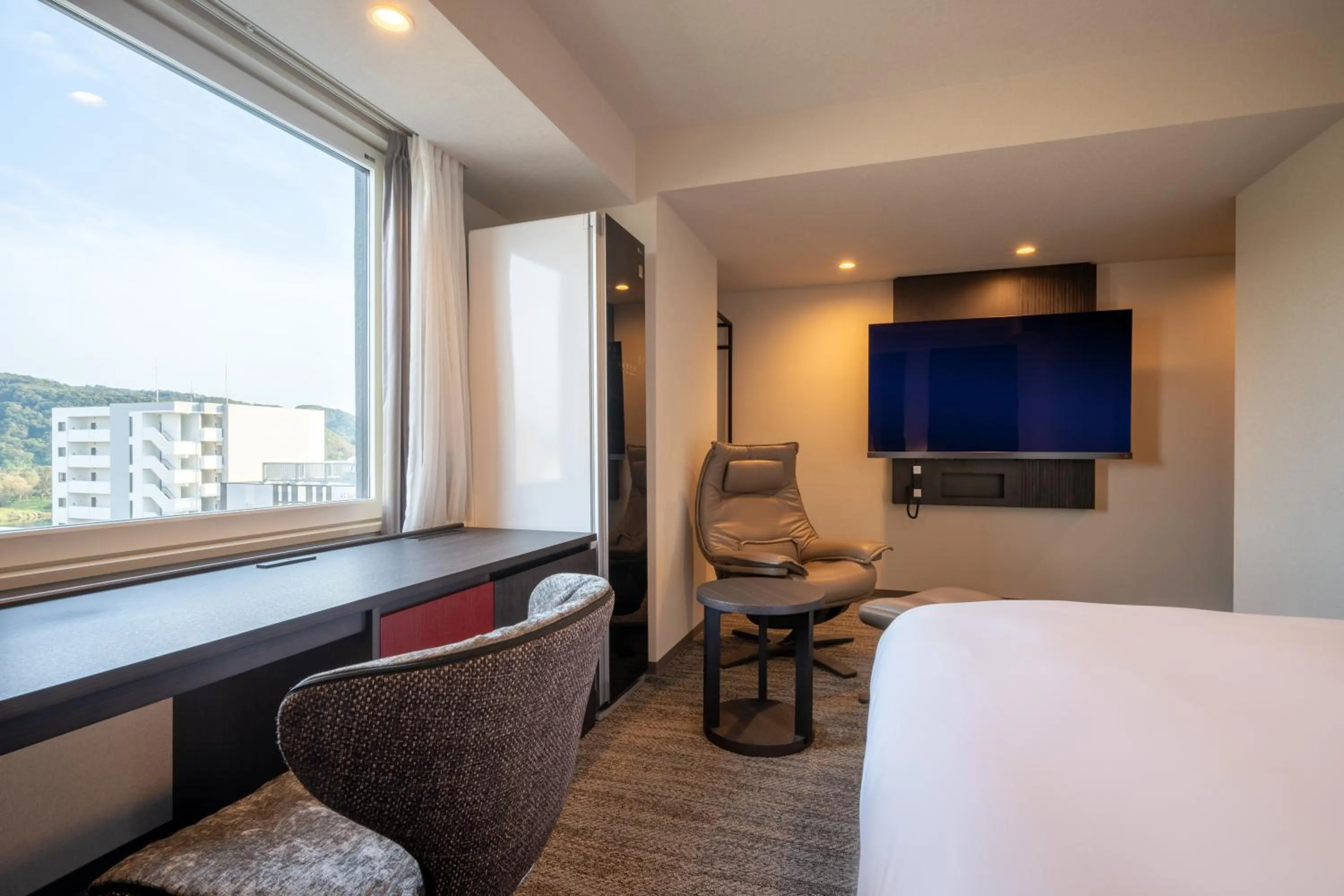 Bed in SAKURA PORT HOTEL