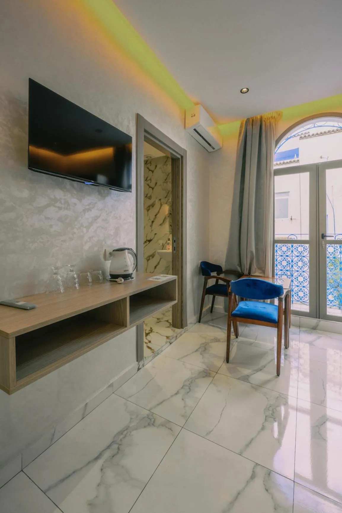 TV and multimedia in Résidence Hoteliére Chez Aziz