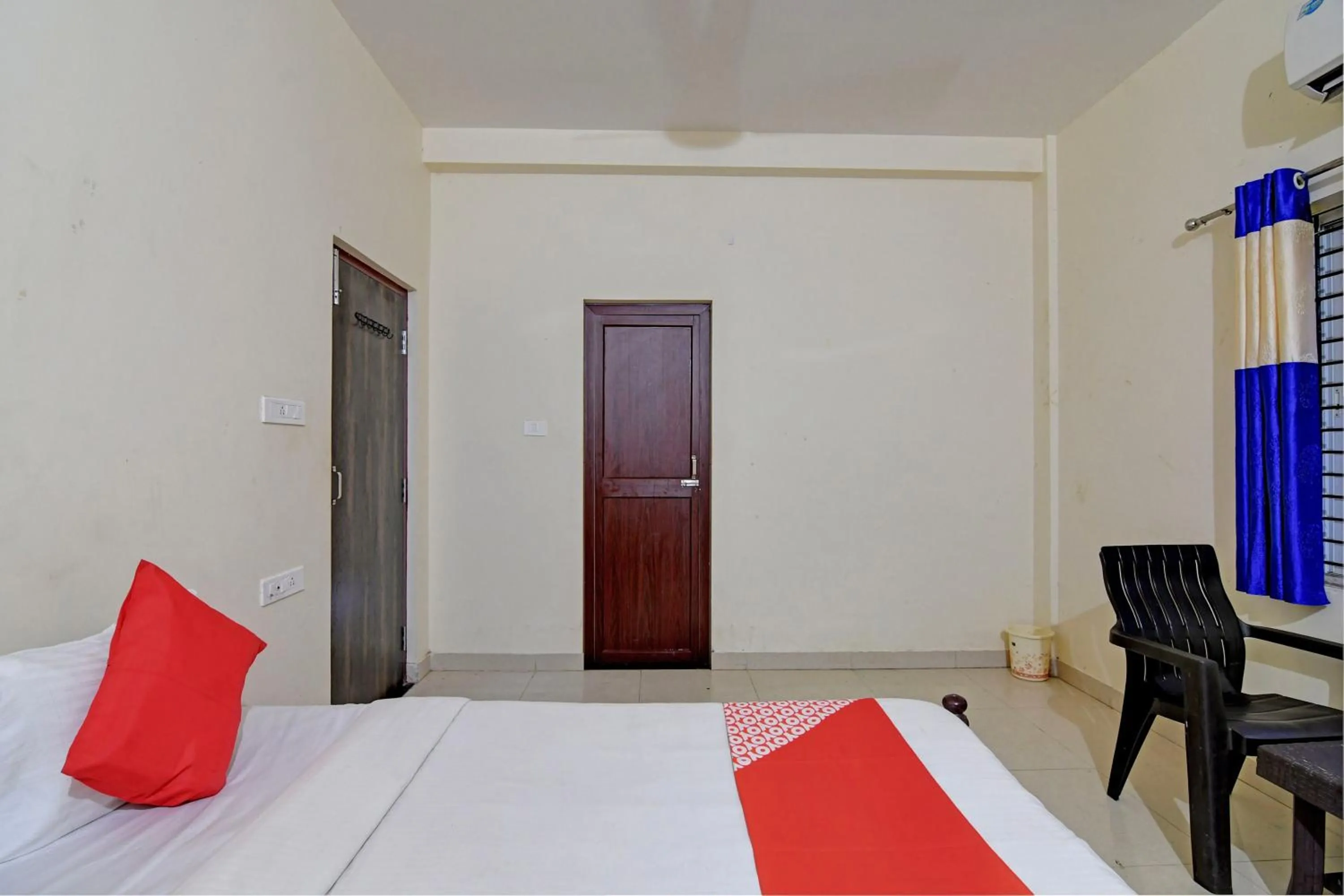 Bedroom in Hotel O Swiss stay