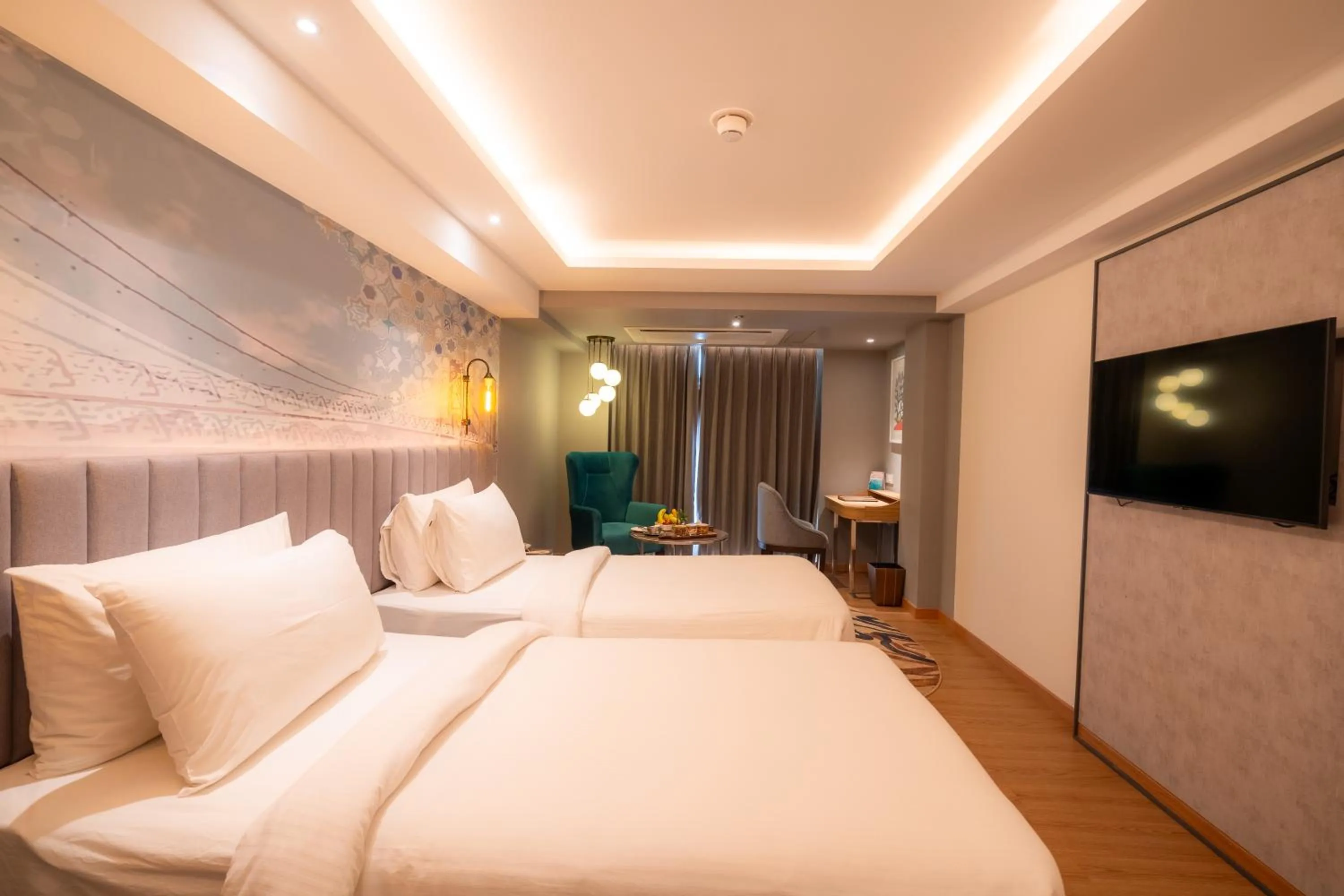 Photo of the whole room, Bed in Golden Tulip Bhopal