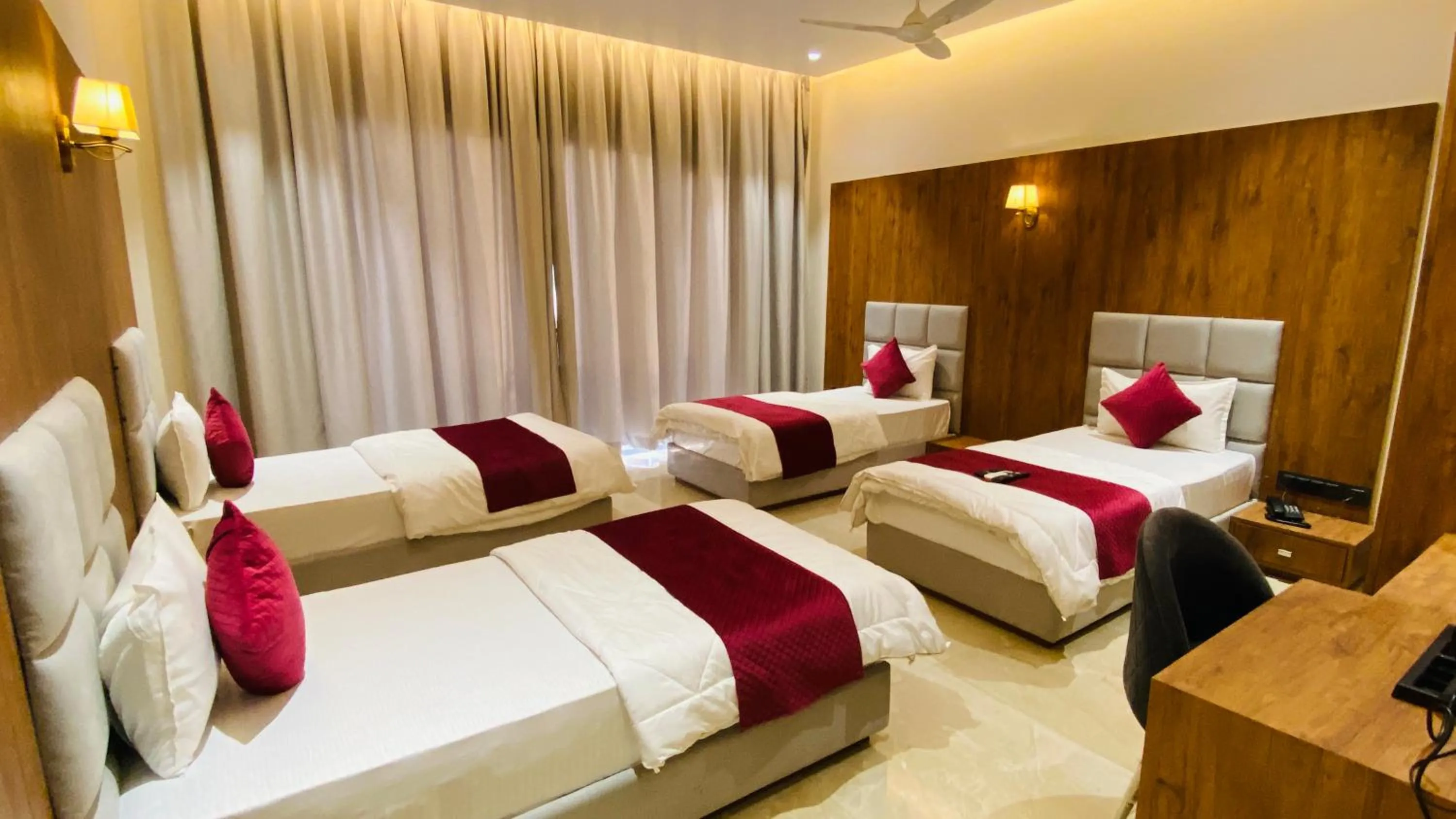 Photo of the whole room, Bed in Gaurison Hotel and Resorts