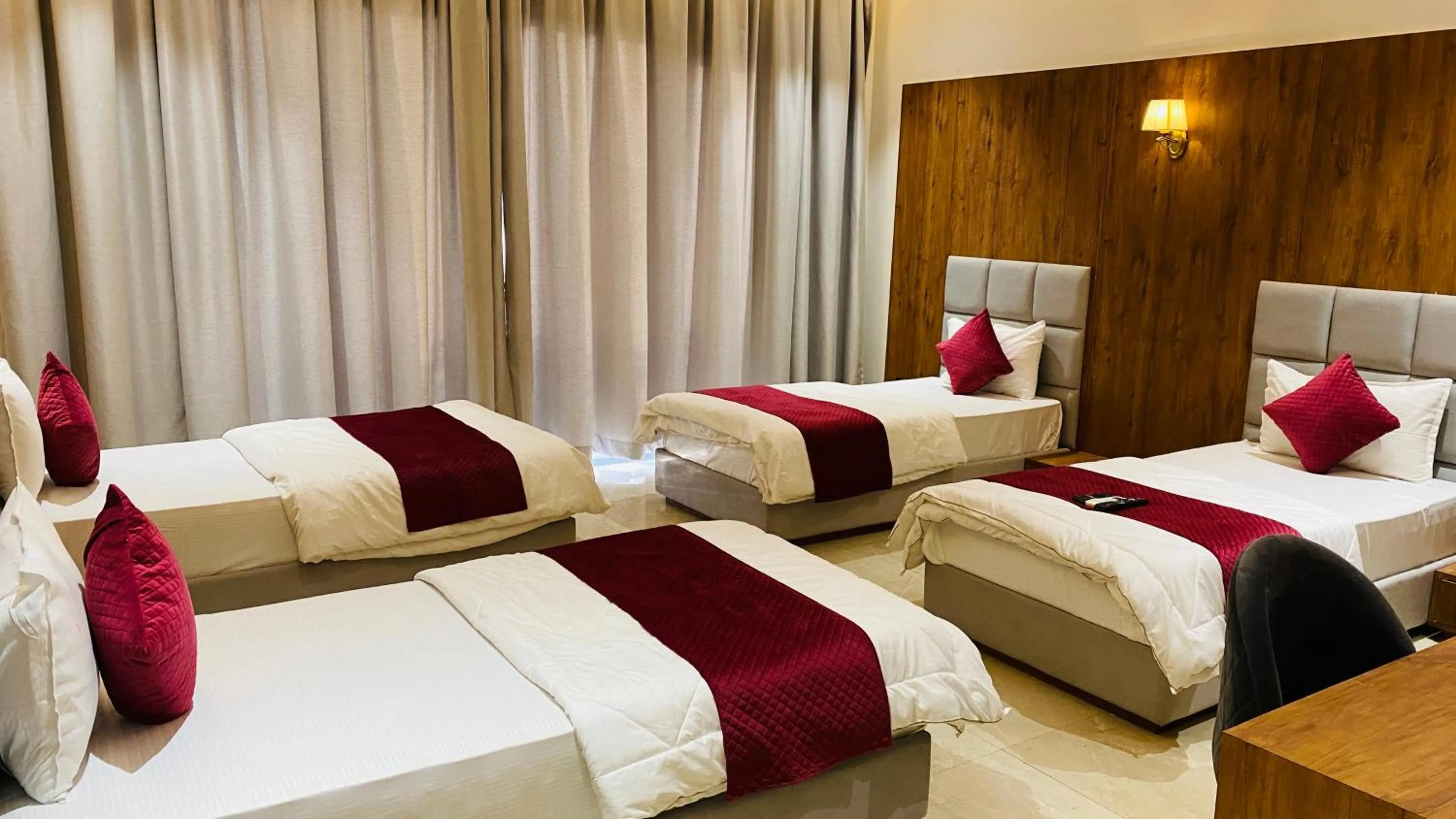 Photo of the whole room, Bed in Gaurison Hotel and Resorts