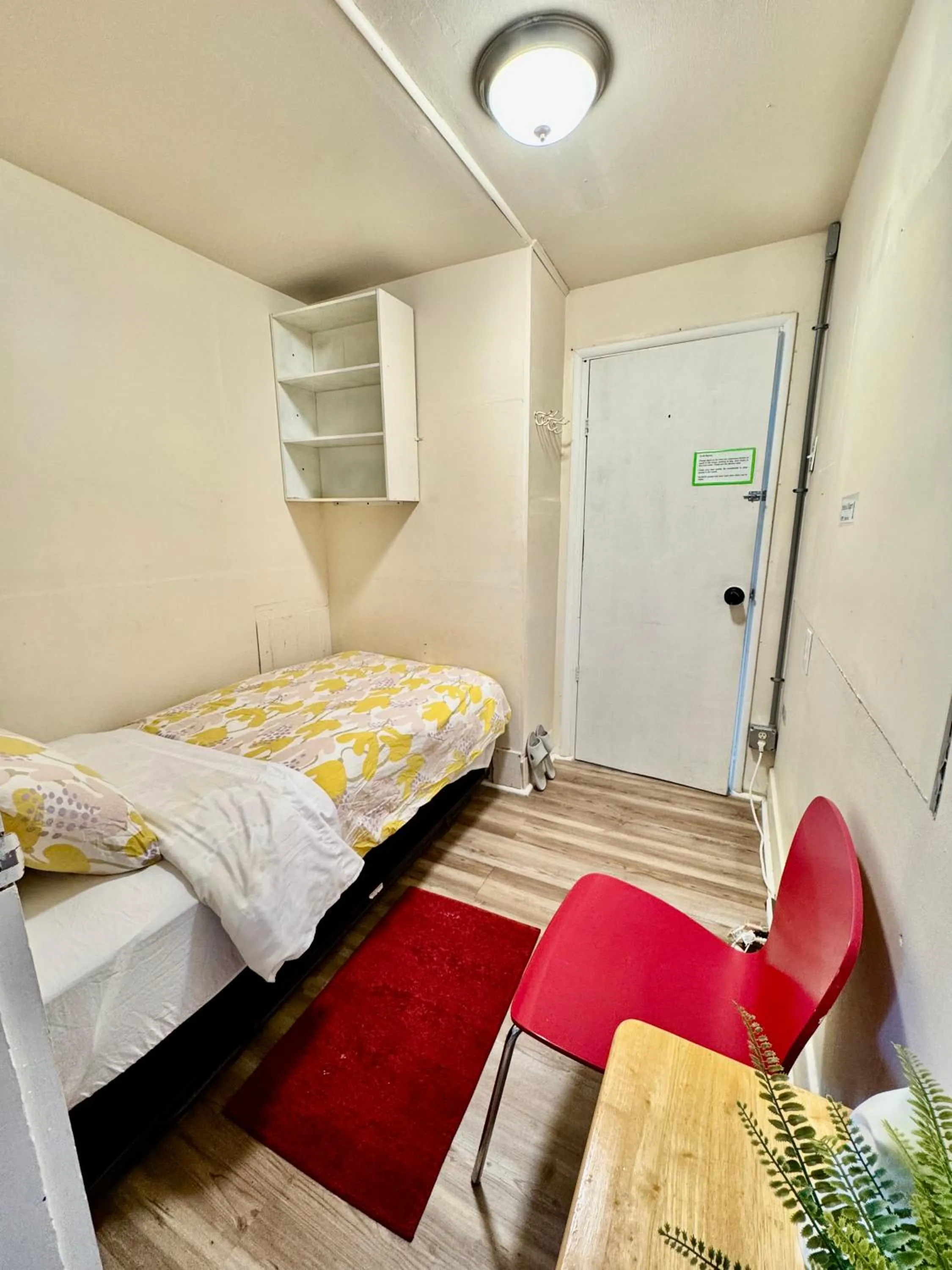 Bed in Tiny Private Room at the Upper Level of a Big House with Shared Bathroom