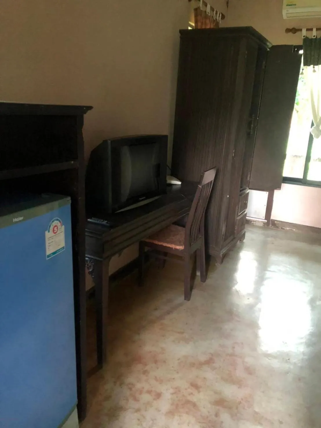 Communal lounge/ TV room in Petpumok Wangnamkhiao Hotel