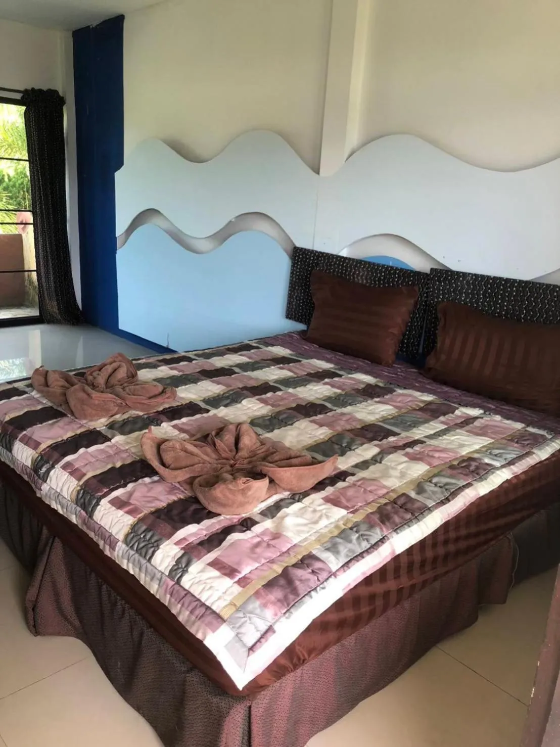 Bed in Petpumok Wangnamkhiao Hotel