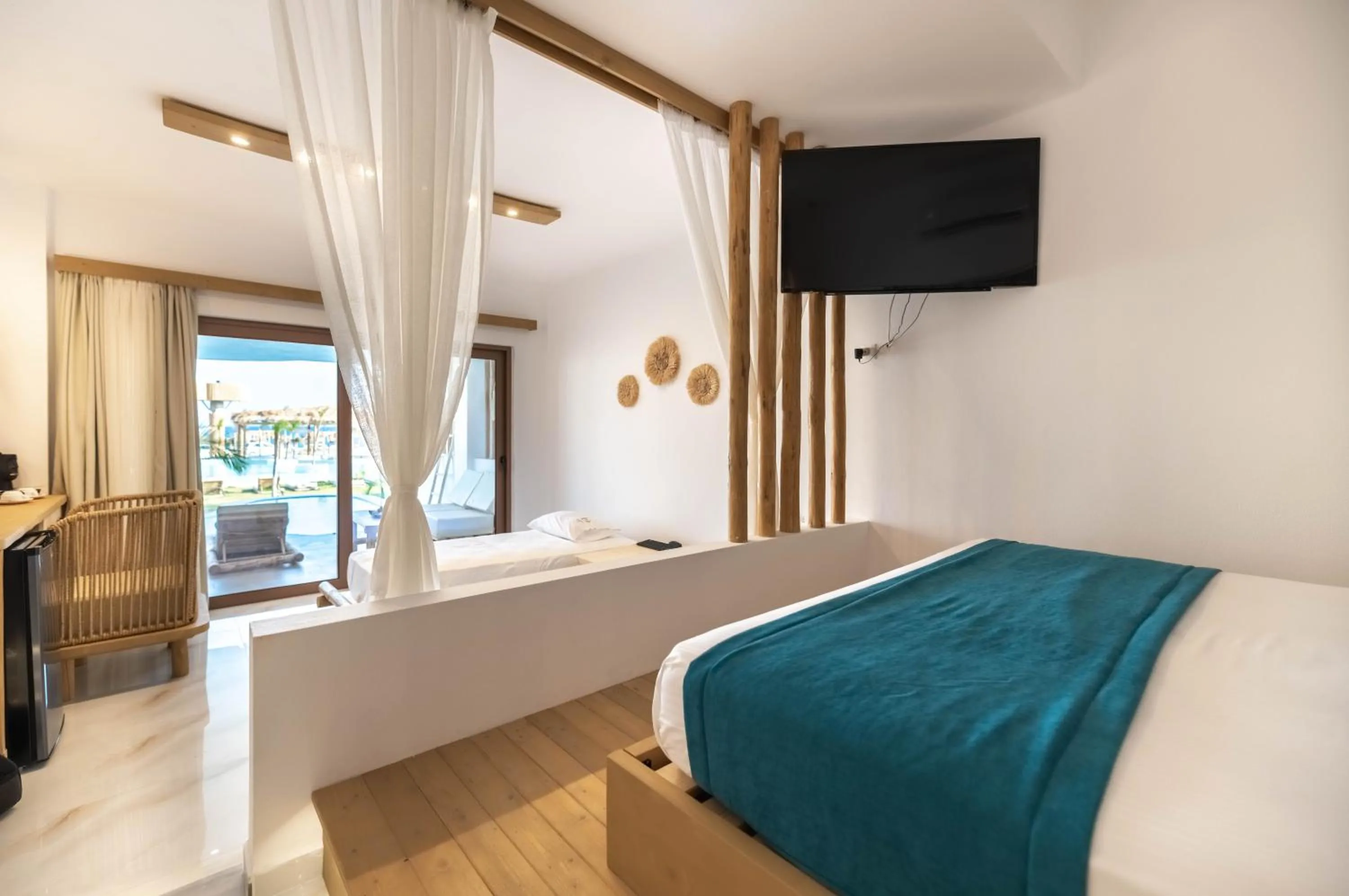 Bed in Alia Beachfront Suites and Spa