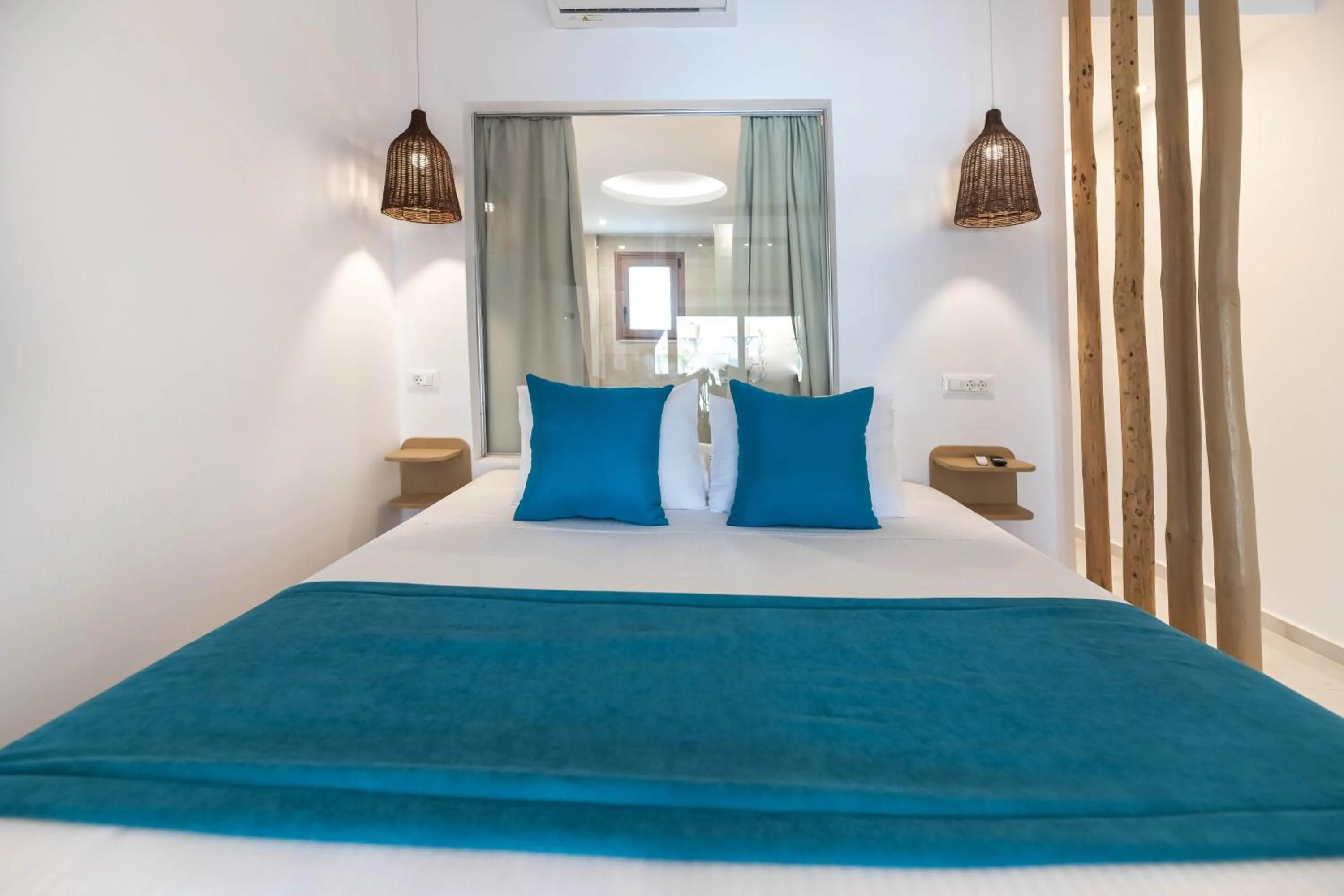 Bed in Alia Beachfront Suites and Spa